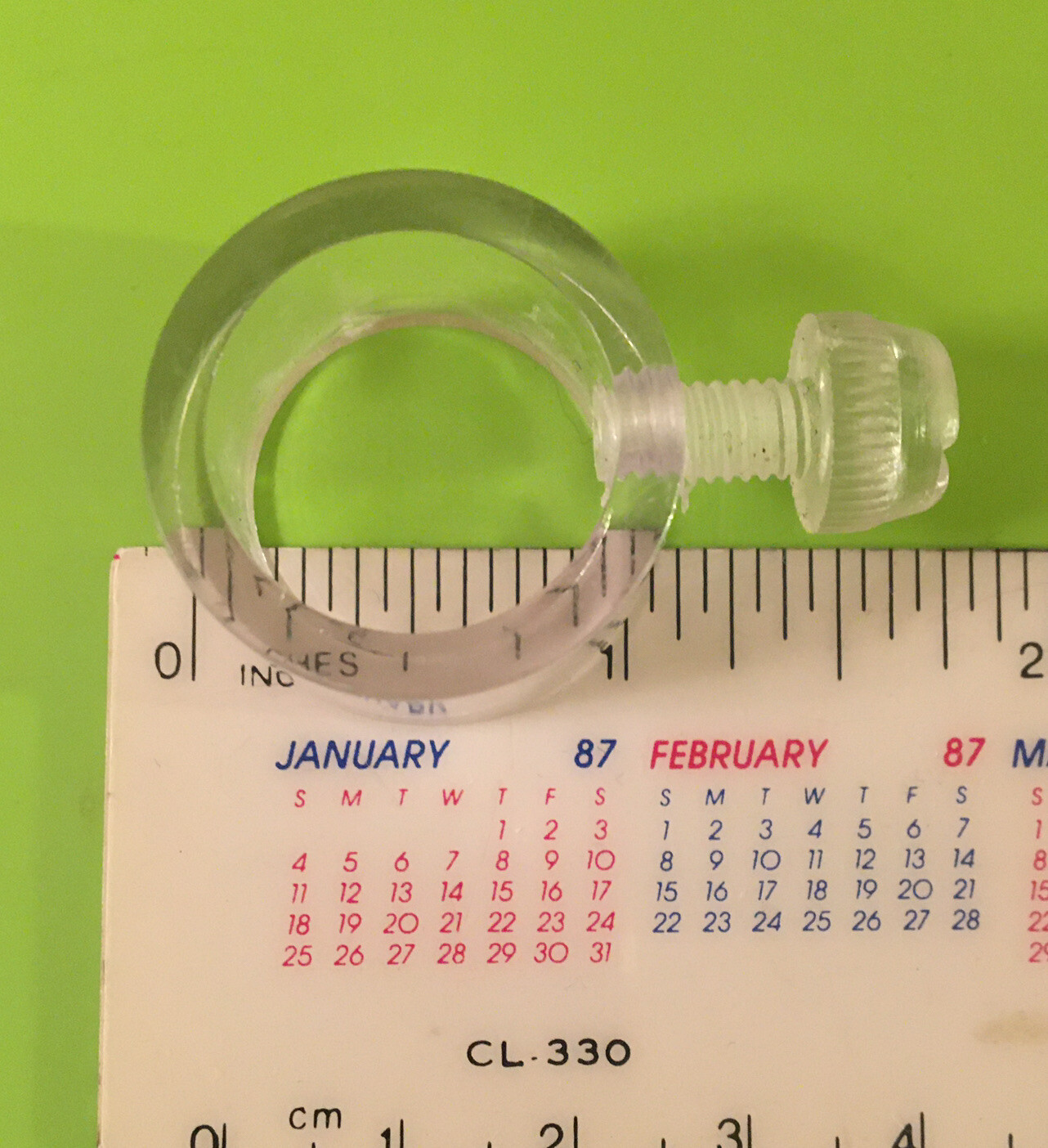 Acrylic round clamp, retail POS signage hardware, about 3/4” diameter, threaded
