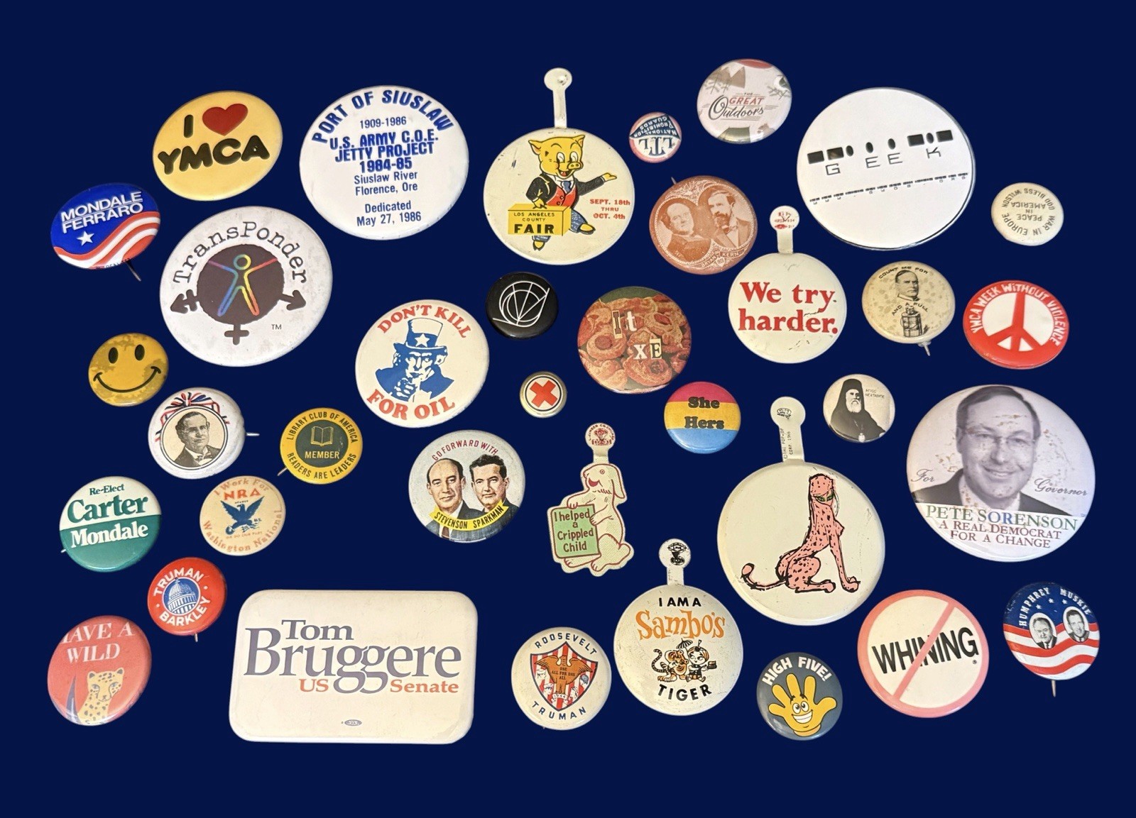 collection of vintage pinback buttons and political campaign memorabilia