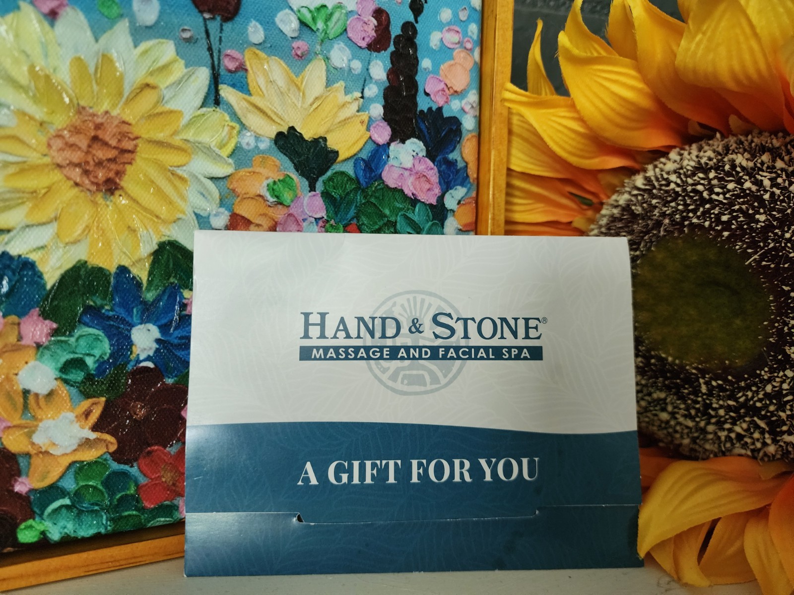 HAND & STONE MASSAGE AND FACIAL GIFT CARD VALUE $180