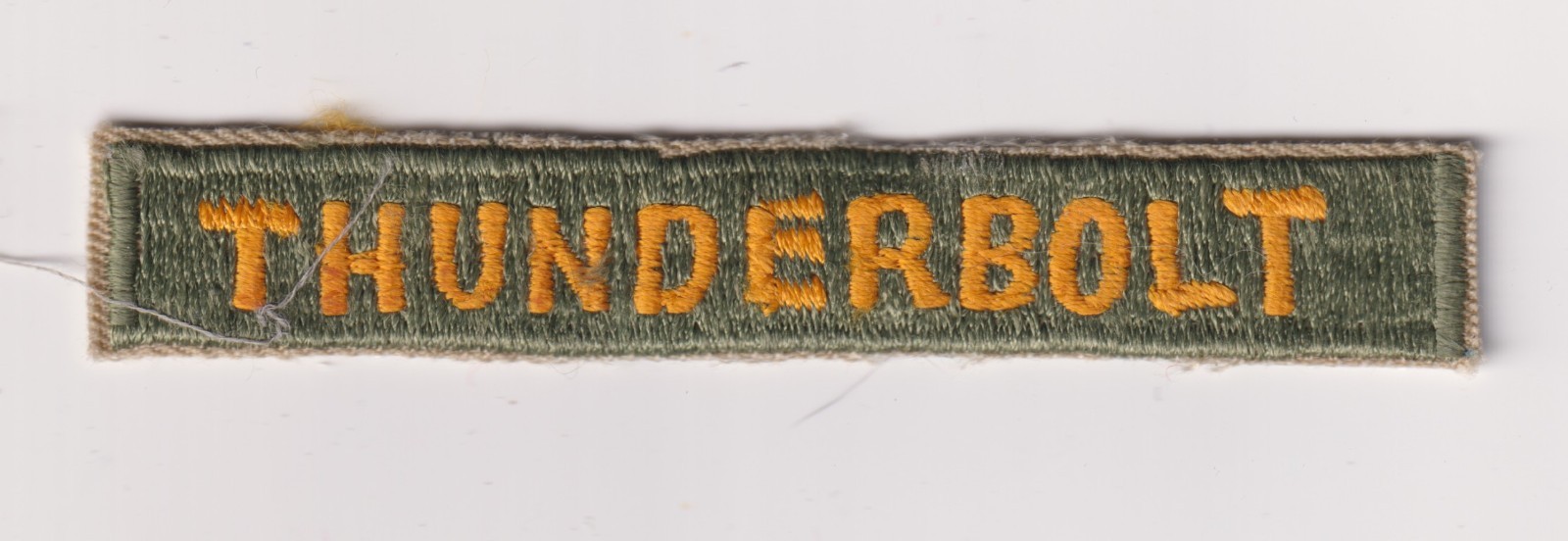 11th Armor Division Thunderbolt tab patch reproduction gold on green 1970s make