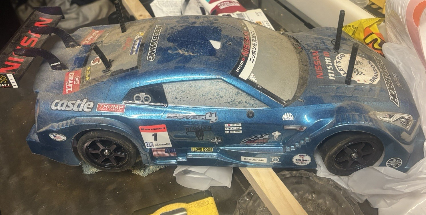 Tamiya TT-02 Nissan 1:10 Brushless 4WD Touring Car Blue Ready to Go Hobby Grade