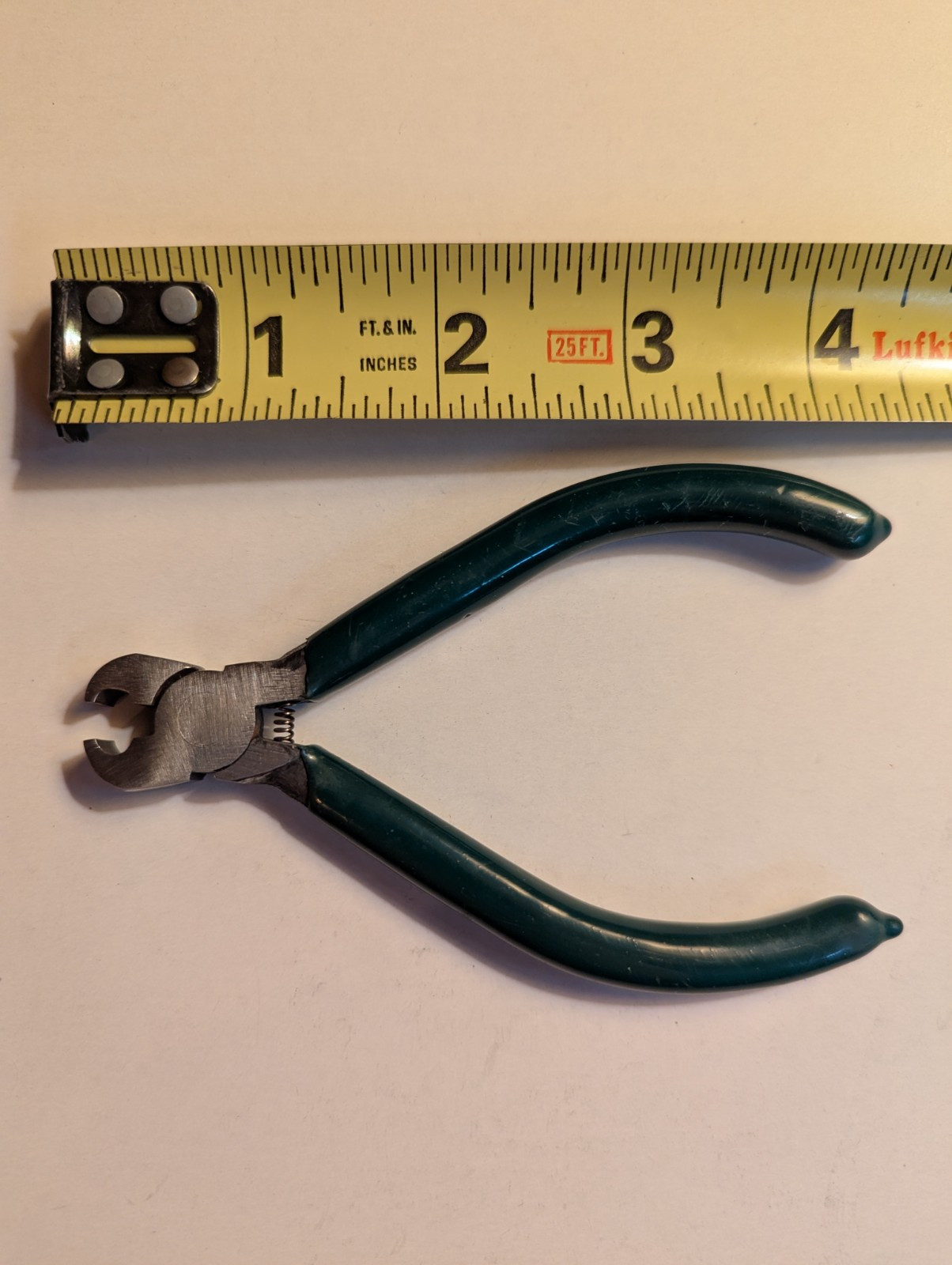 Archery Knocking Pliers  with Green Rubber Coated Grips.