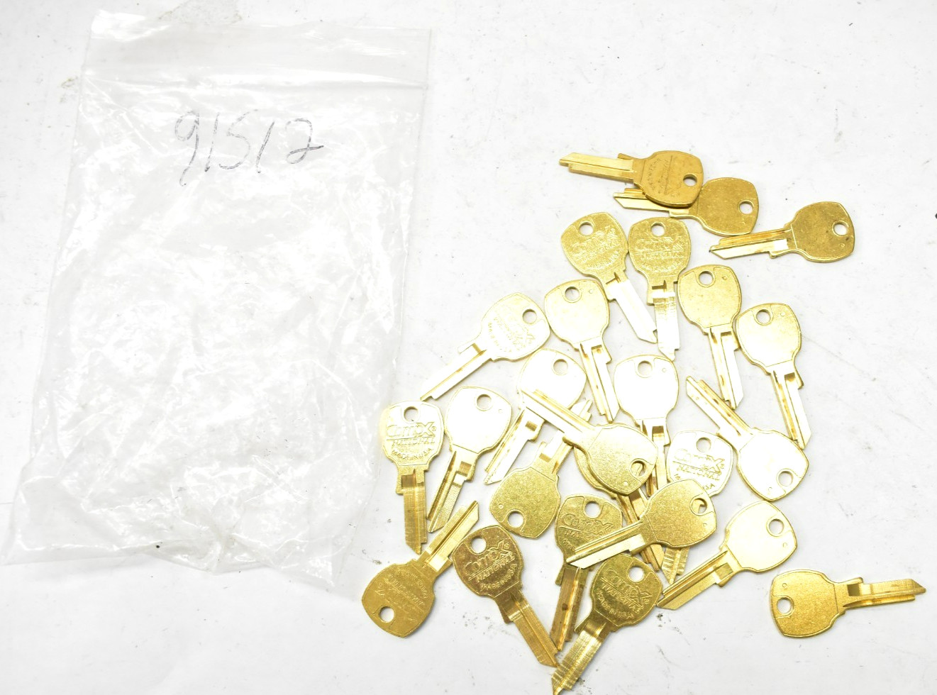 Lot of 25 CompX National Key Blanks 91512 CBU Keys Brass For K91910 USED