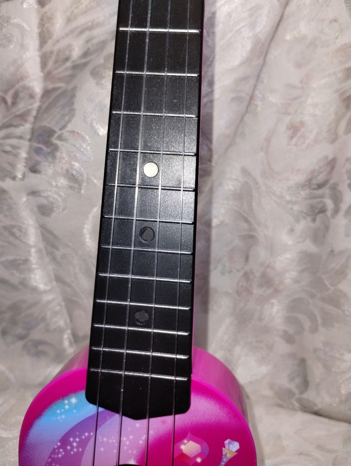 First Act Discovery Shimmer and Shine soprano toy ukulele.