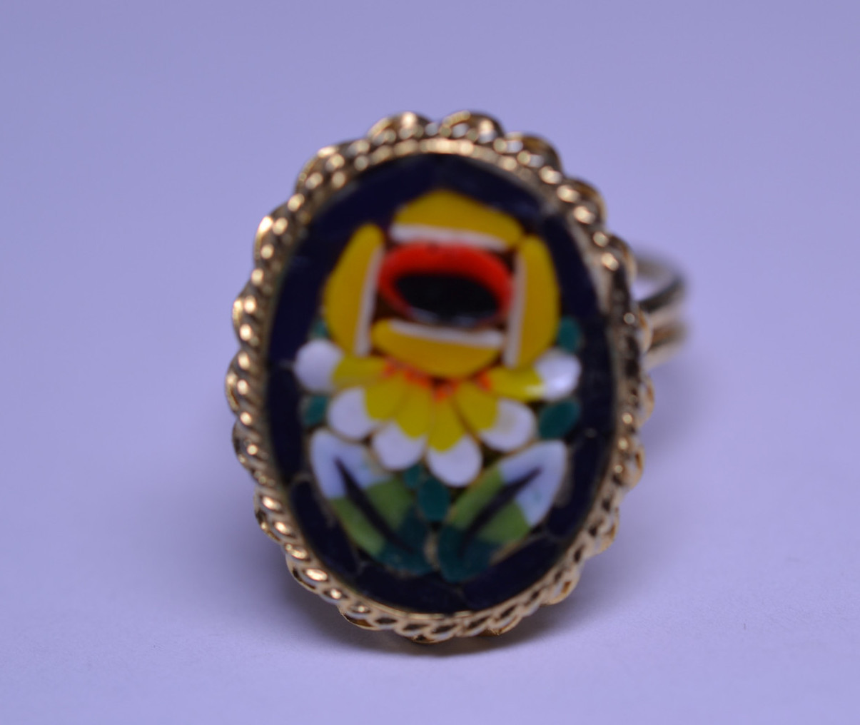 VINTAGE OVAL MOSAIC RING FROM ITALY - YELLOW FLOWER ON BLACK  BACKGROUND