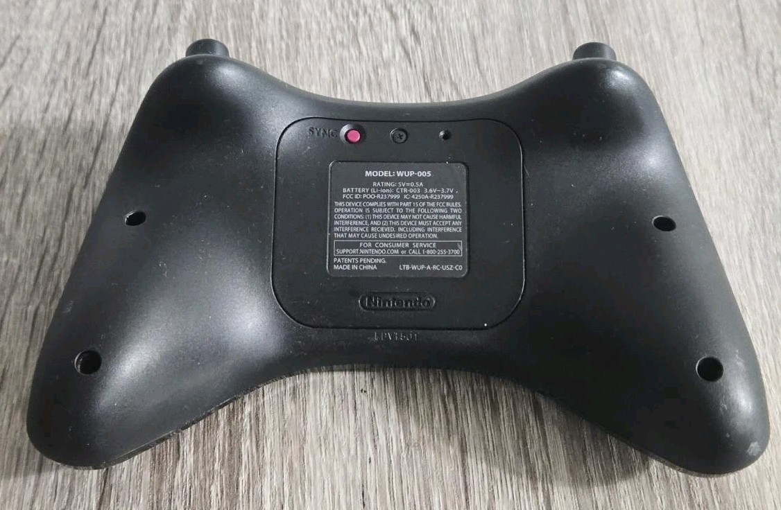 Official OEM Nintendo Wii U Black Wireless Pro Controller Used.