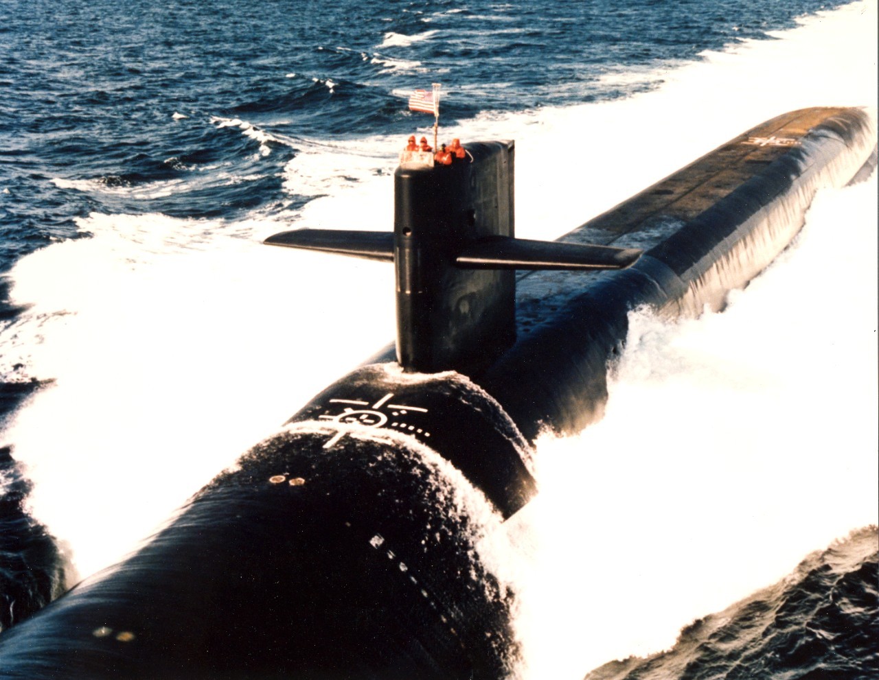 USS Alabama SSGN-731 submarine cruises on surface of ocean Photo Print