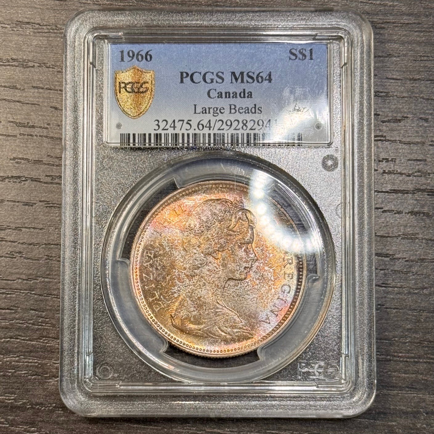 MS64 1966 $1 Canada Voyageur Silver Dollar, PCGS Trueview- Rainbow Toned