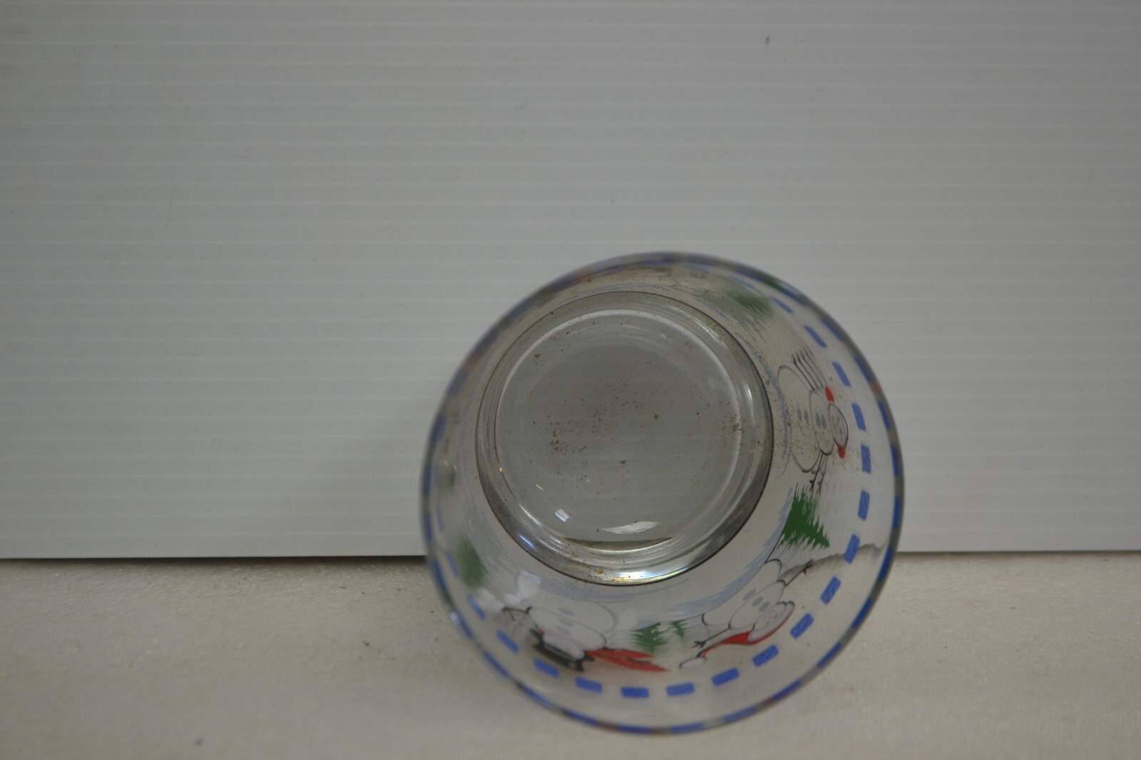snow man drinking glass