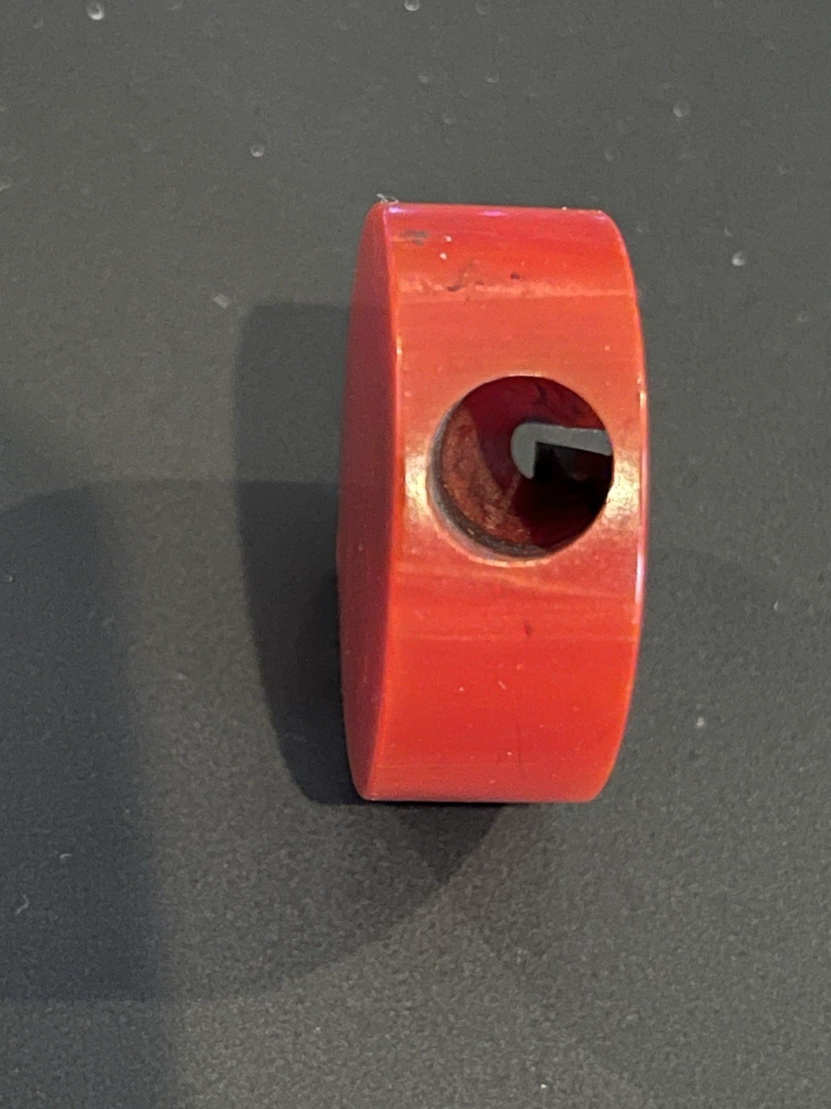 Vintage Red Bakelite Round Pencil Sharpener
