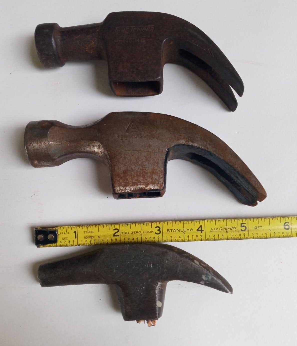 Three Vintage Hammer Heads One is a True Temper No.116. One is a Alltrad Hammer