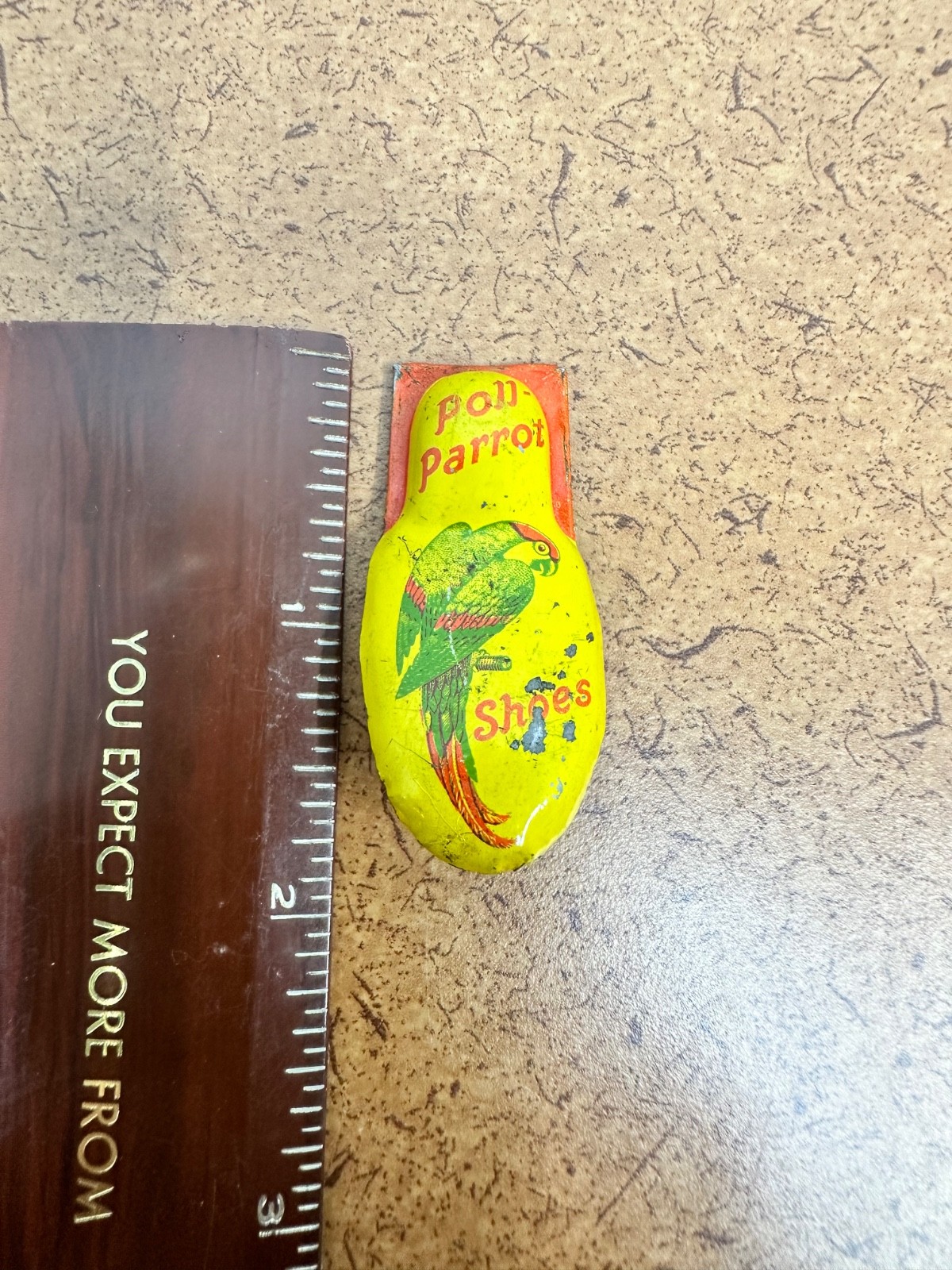 Vintage Poll Parrot Shoes Advertising Tin Toy Clicker