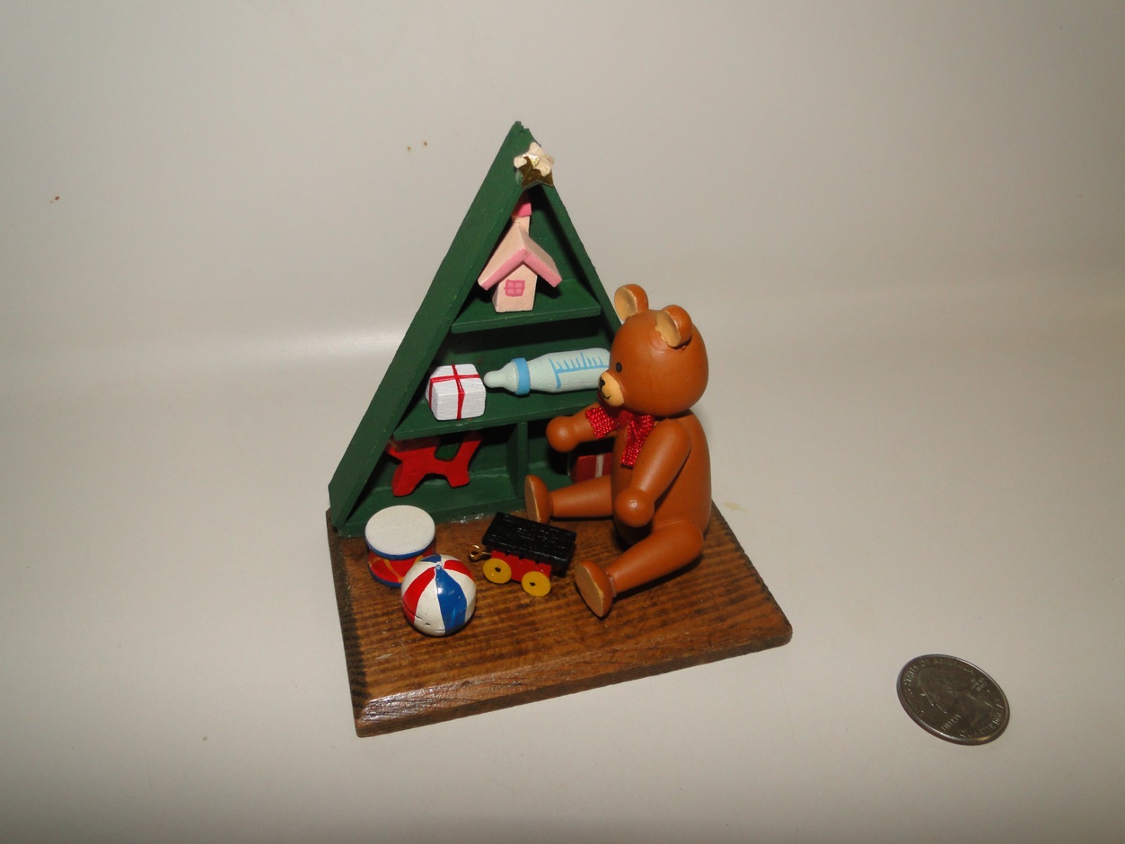 Vtg Mini Wooden Teddy Bear in Front of Shelf of Toys,  Made Taiwan, 4.25" Tall