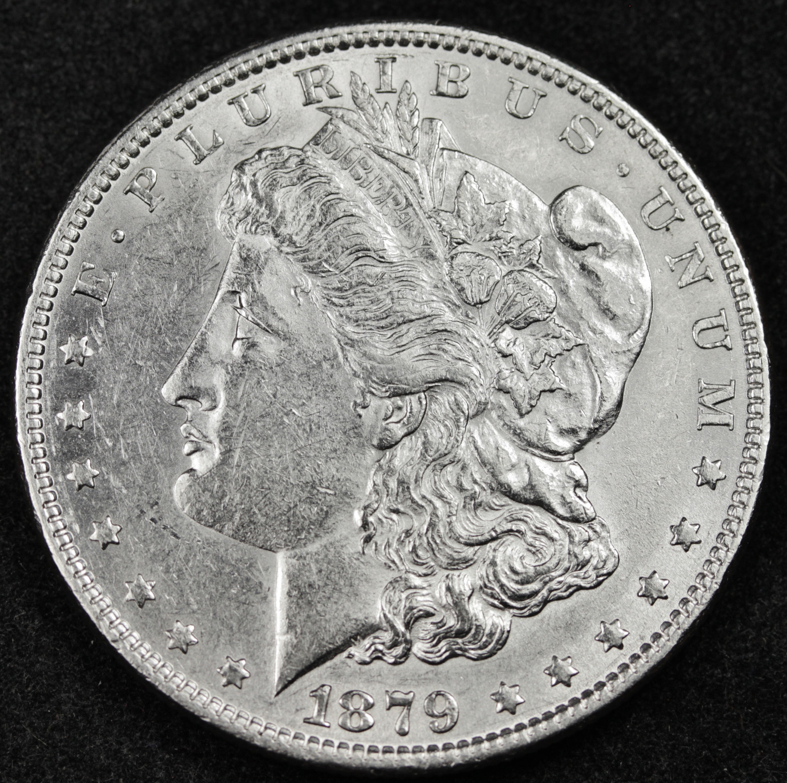 1879 Morgan Silver Dollar.  A.U. (Inventory A)