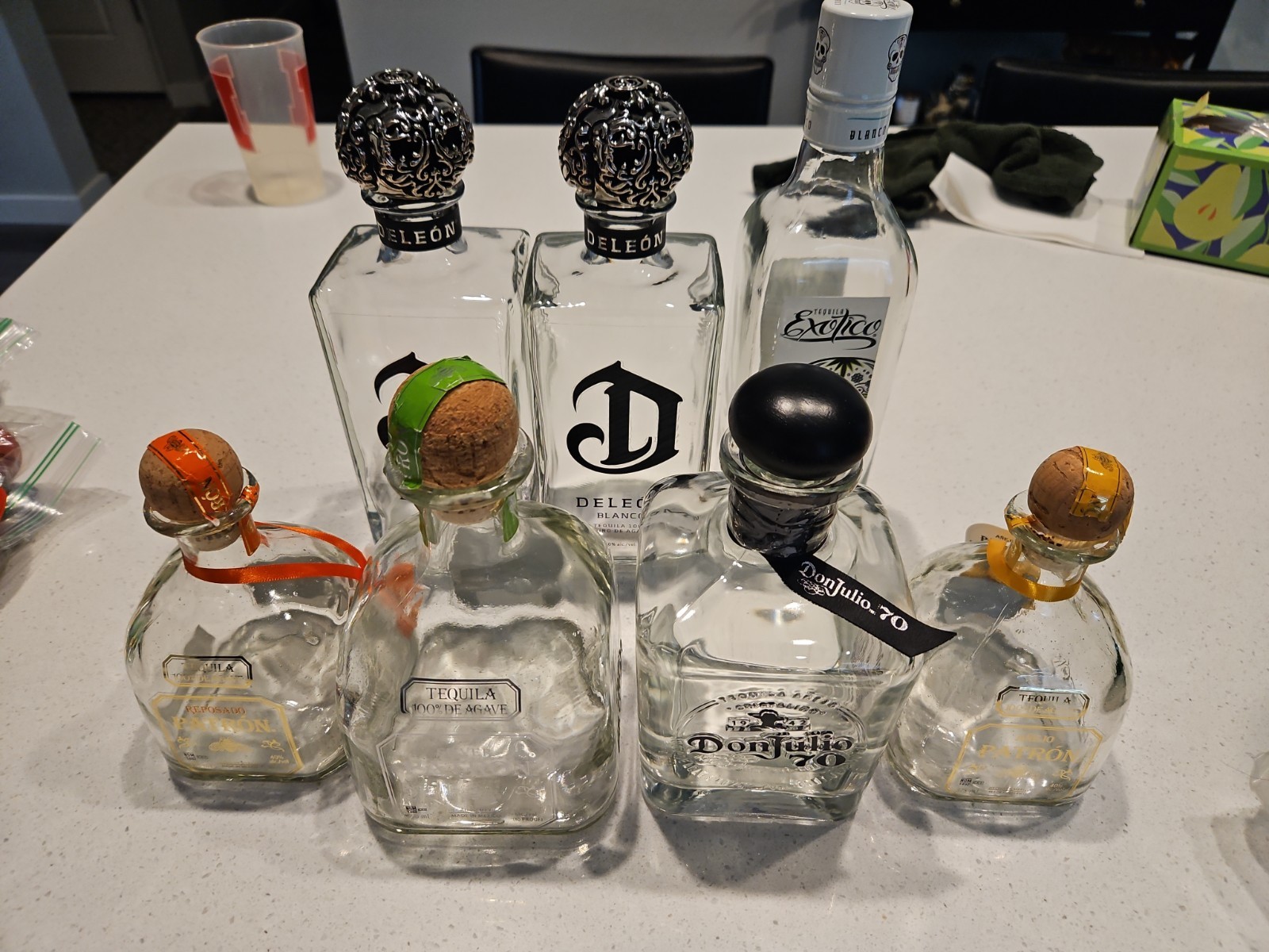 7 Tequila Bottle Lot: Deleon, Exotico, Don Julio, Patron W Toppers