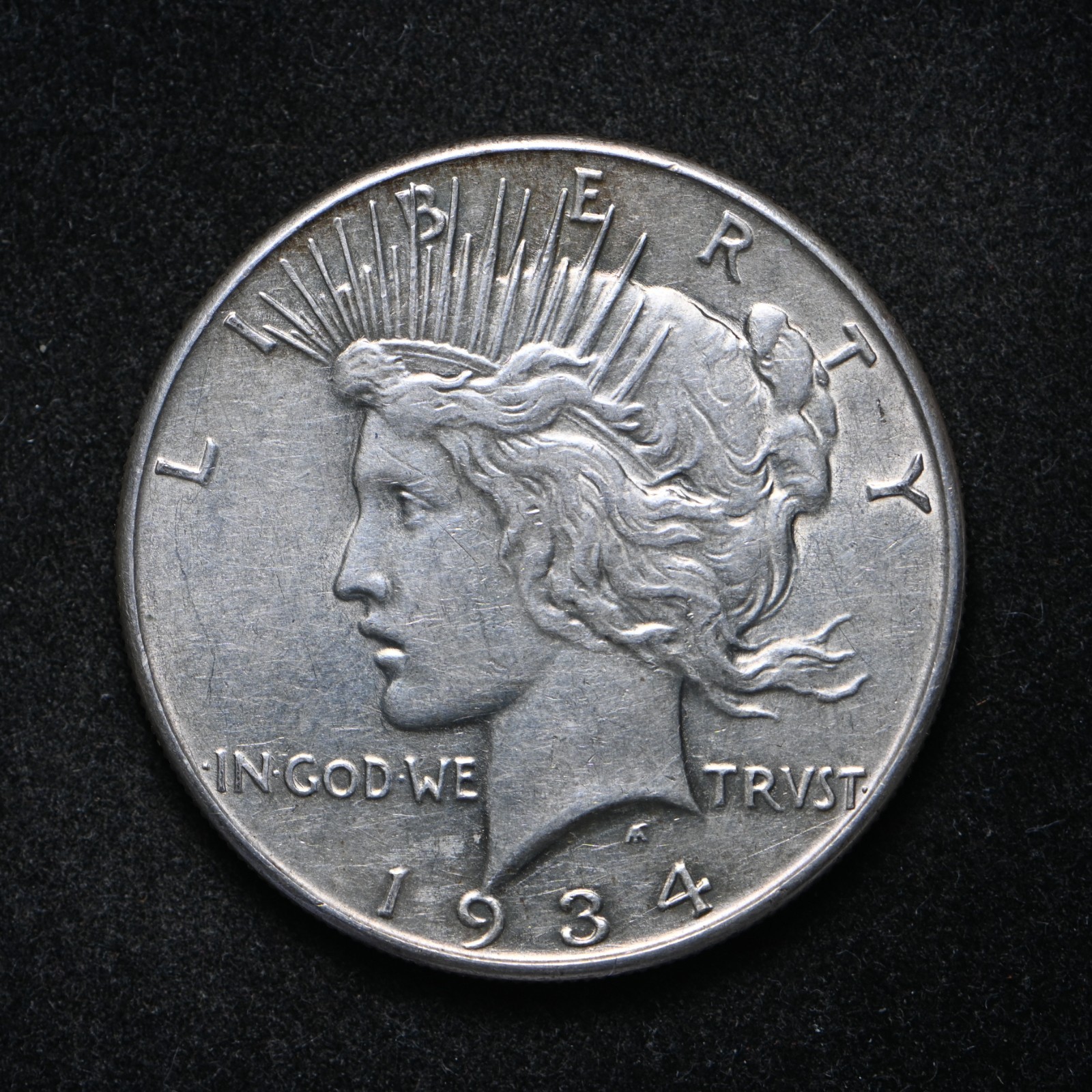 1934 Peace Silver Dollar AU Cleaned (cn17234)