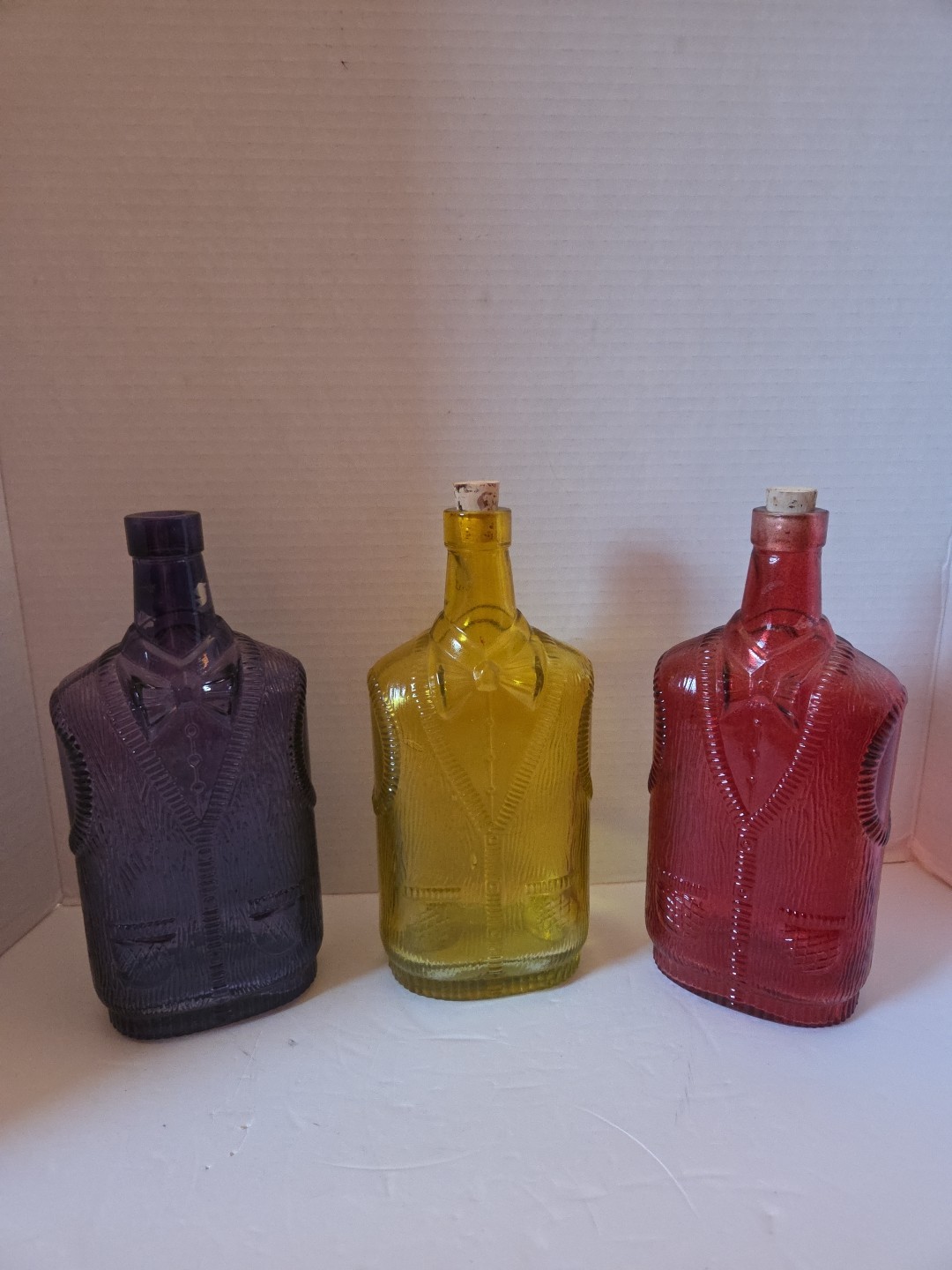 3 Empty Liquor Bottles Purple, Red And Yellow With Bow Tie & Sweater Design!
