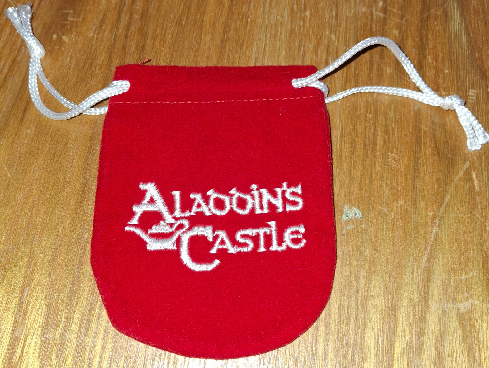1 Vintage Alladdin's Castle Token Bag unused