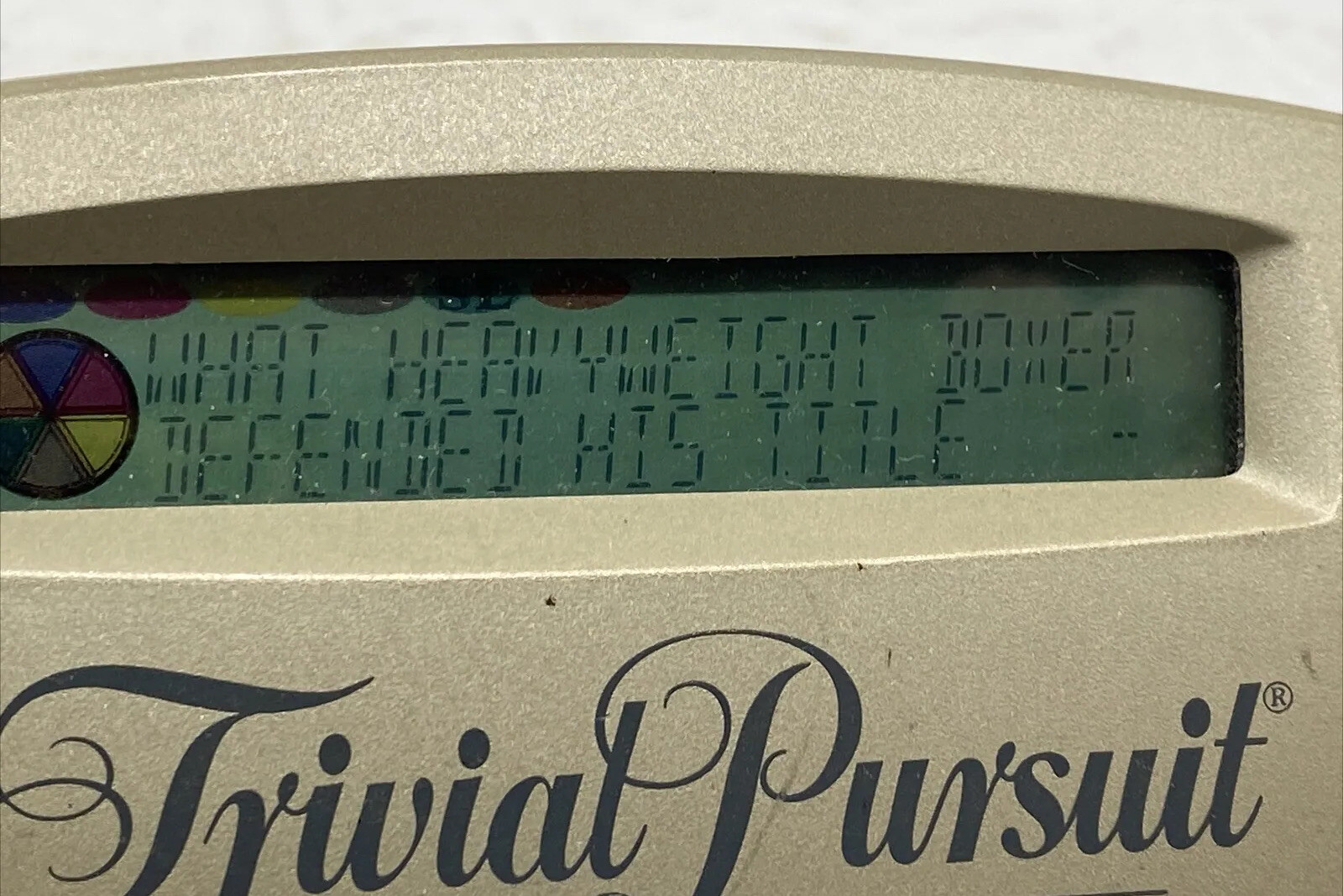 Trivial Pursuit The Best of Genus Electronic Handheld Portable Game 1997 TESTED