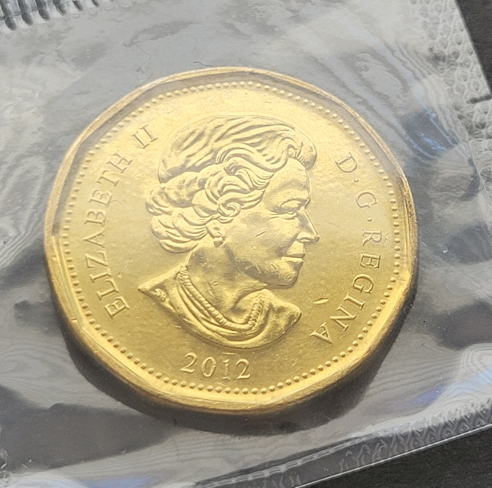 ***  CANADA   LOONIE  2012  ***  PROOF  LIKE  ***  SEALED  COIN  ***