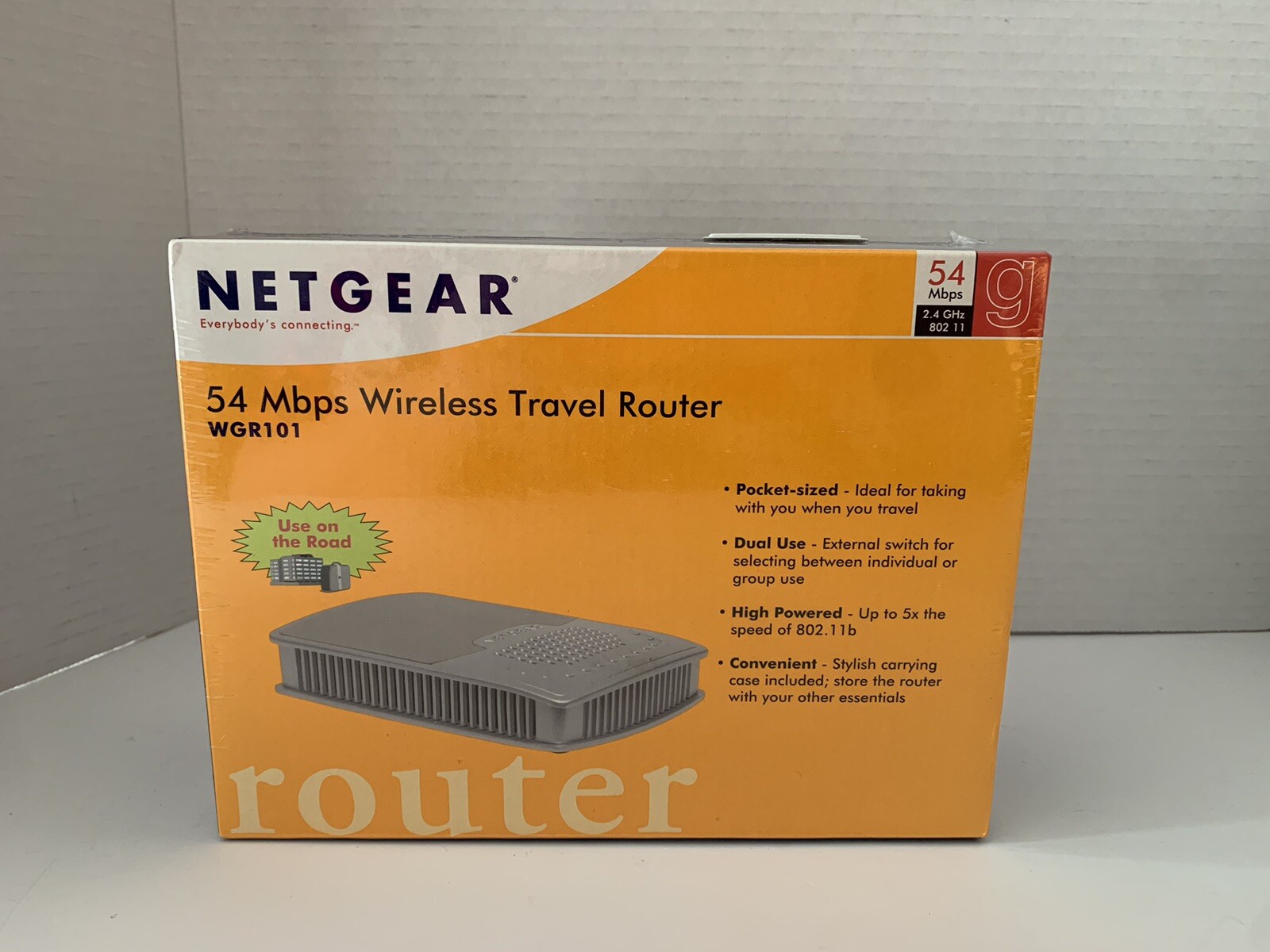 Netgear WGR101 54 Mbps 1-Port 10/100 Wireless G Router WGR101NA New w/carry Case