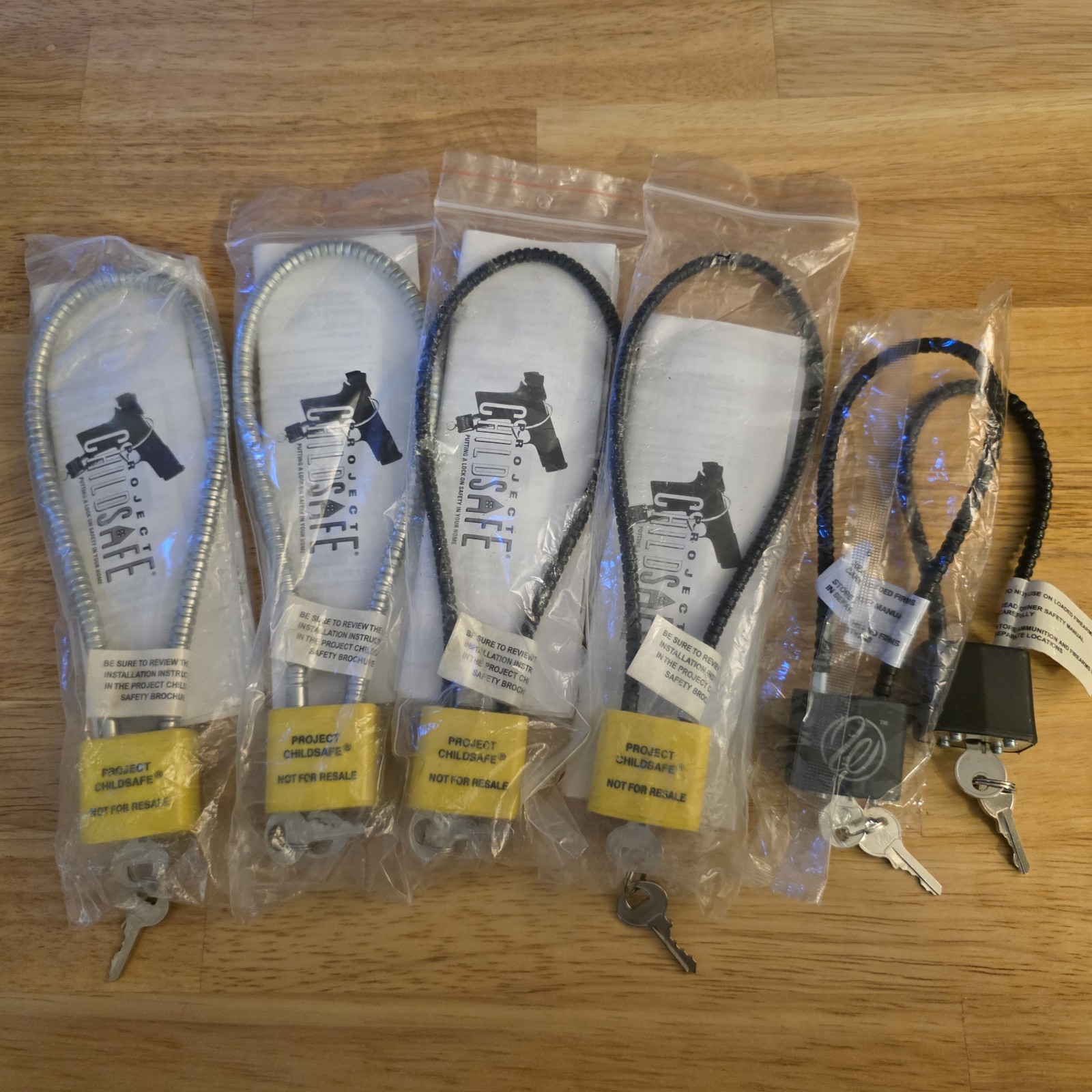 Lot of six keyed firearm safety cable locks