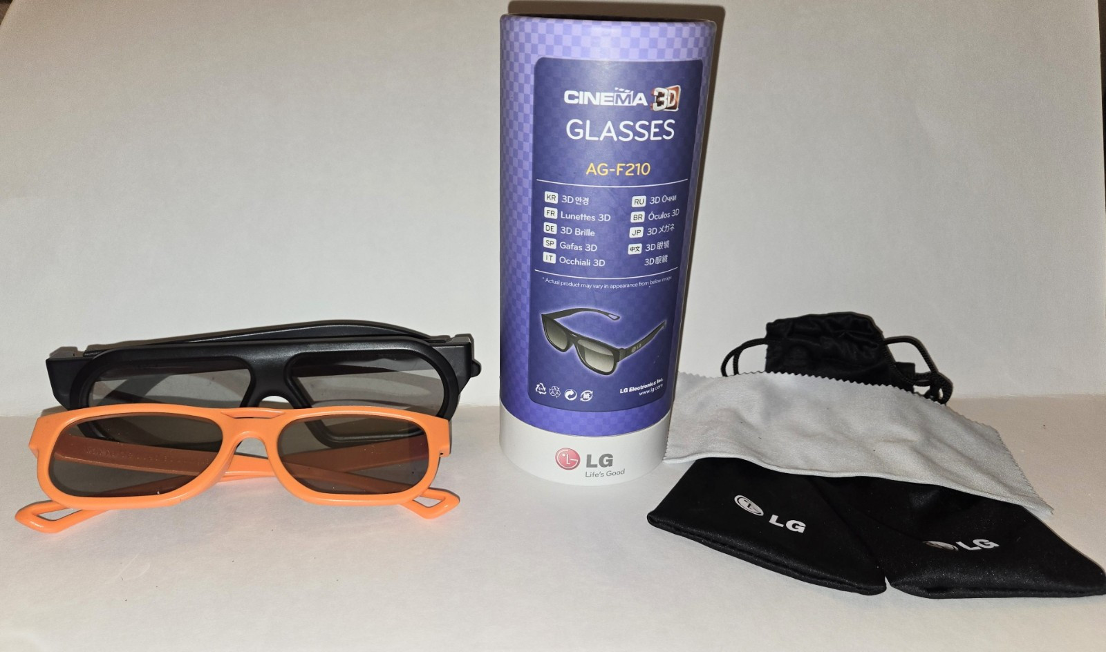 3D Glasses 1 Pair Is Orange LG 3D the 2nd Pair Is Black Master Image