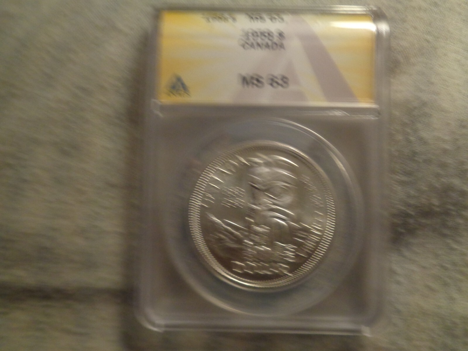 1958 canadian dollar graded ms 63 by anacs.