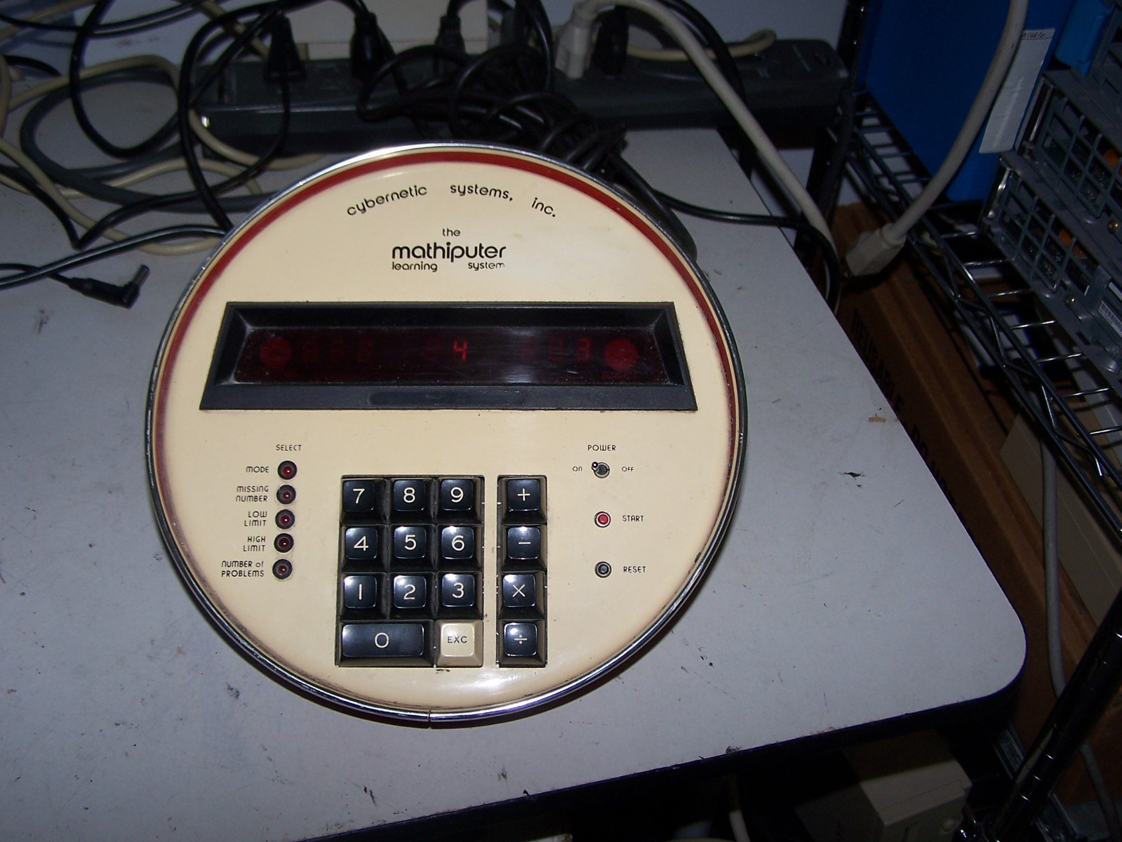 MATHIPUTER LEARNING SYSTEM CYBERNETIC SYSTEMS INC - Red, powers on, Works