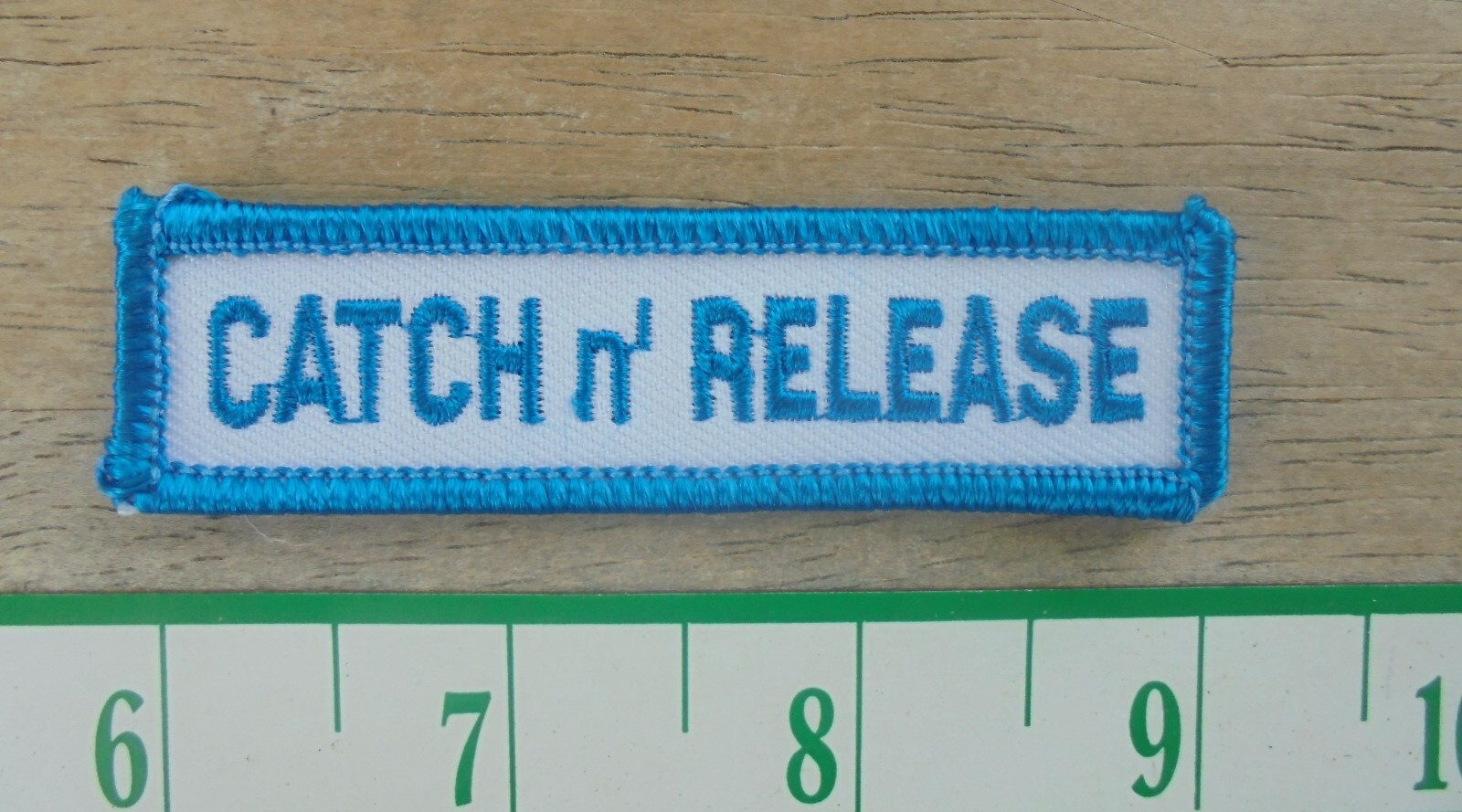 NEAT "CATCH N RELEASE" SEW ON CLOTH PATCH  3X.75"