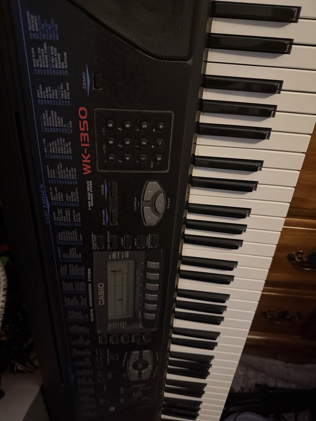 Casio WK-1350 Premium Keyboard Package with Headphones, Stand and Sustain Pedal