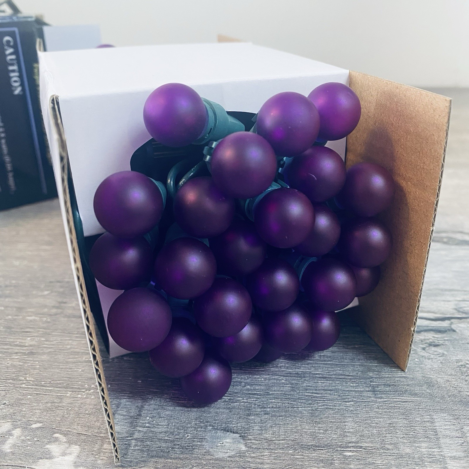String of Purple Frosted 50 LED G15 Lights Suitable For Indoor And Outdoor Use