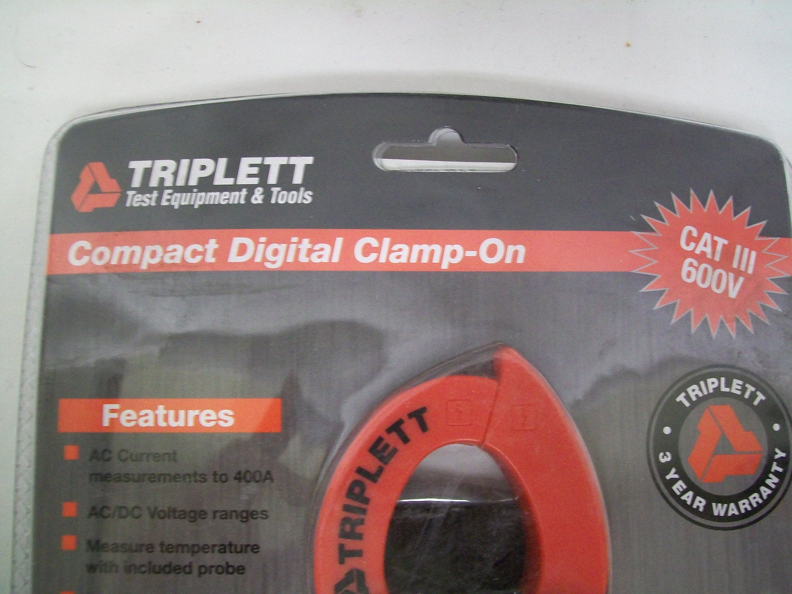 Triplett Model 9305 Compact Digital Clamp On Meter. New in Package
