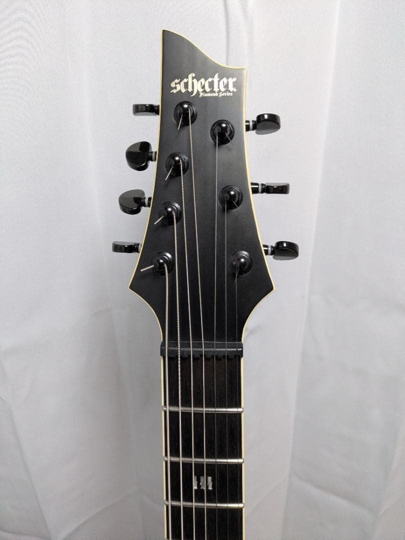 Schecter C-7 Sls Elite Evil Twin 7
