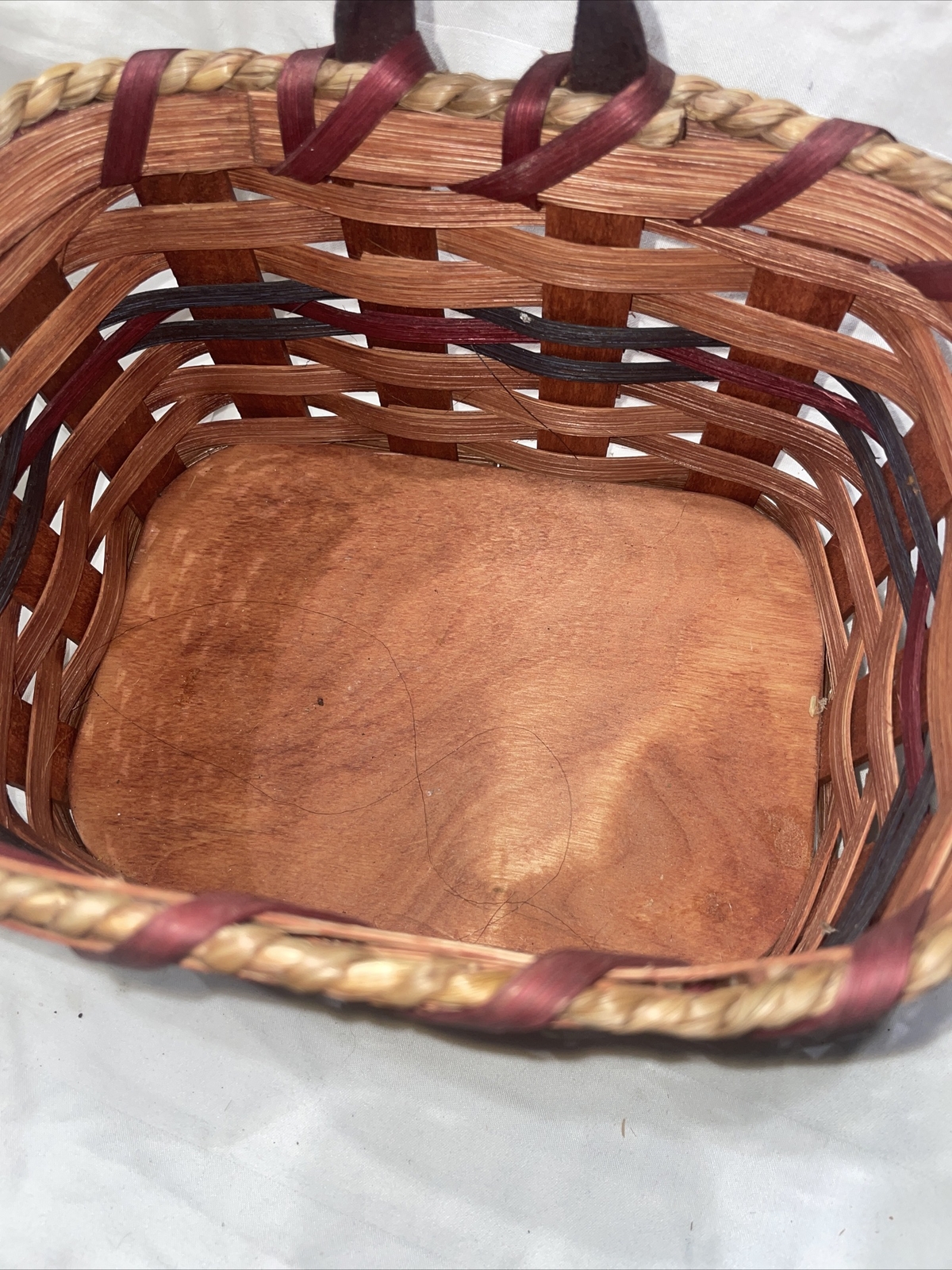 Woven basket With Wooden Bottom