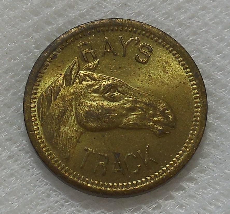 AN OLD RAY'S TRACK HORSE HEAD ARCADE TOKEN