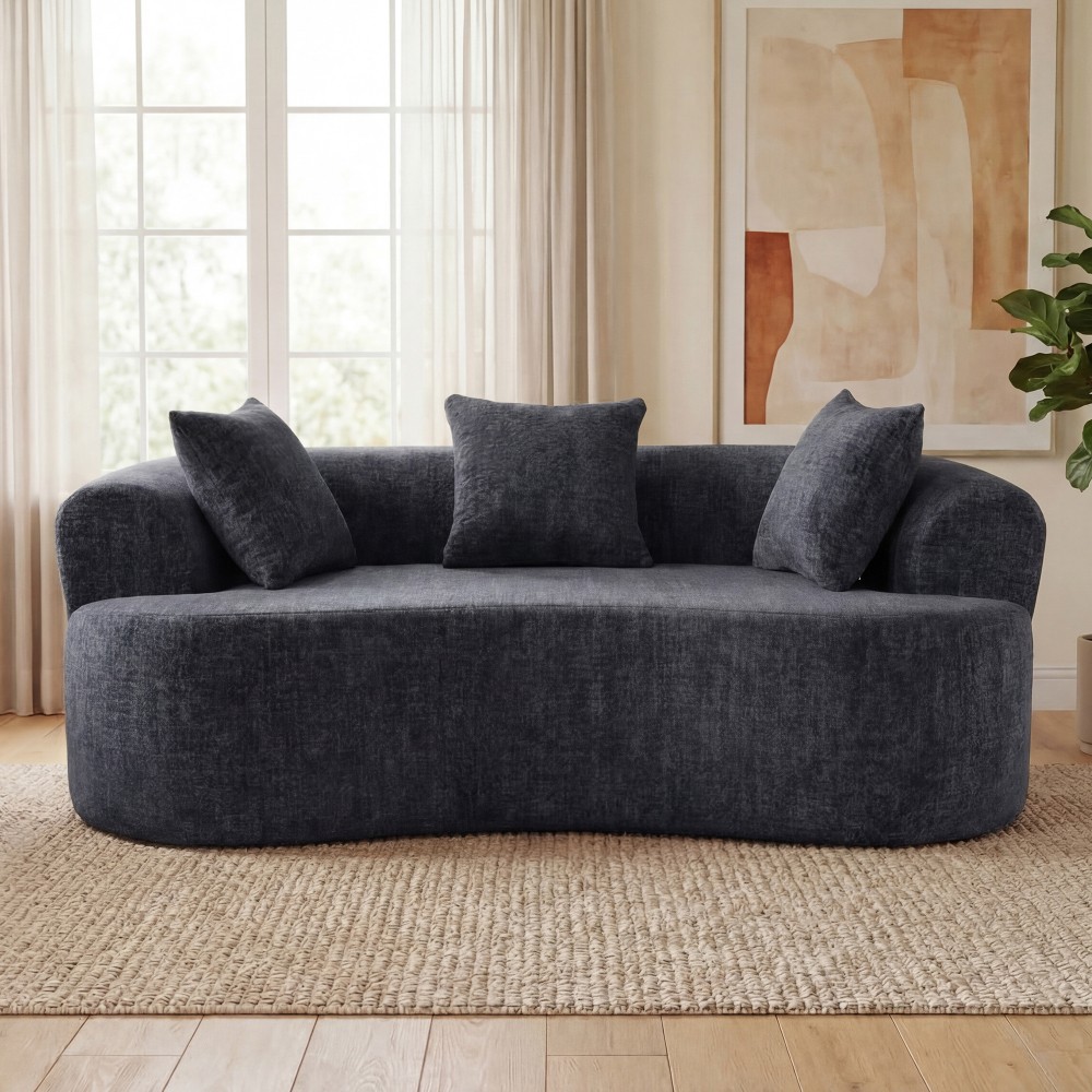 Crescent-shaped sofa, modern low-back design with deep cushions, self-inflating