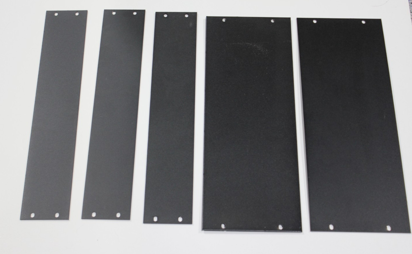 Lot of 5 Rack panels. Quantity of 3 2 RU and 2 4RU panels. Minor blemishes.
