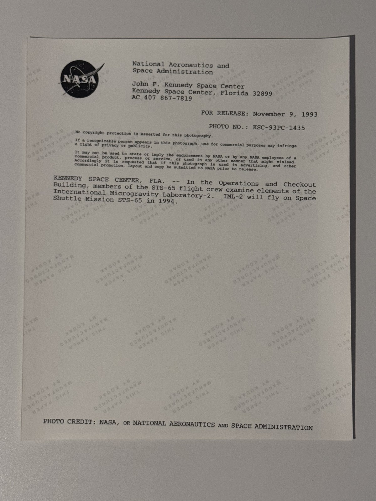 NASA STS-65 Crew Examine IML-2 Payload Elements Press Photo