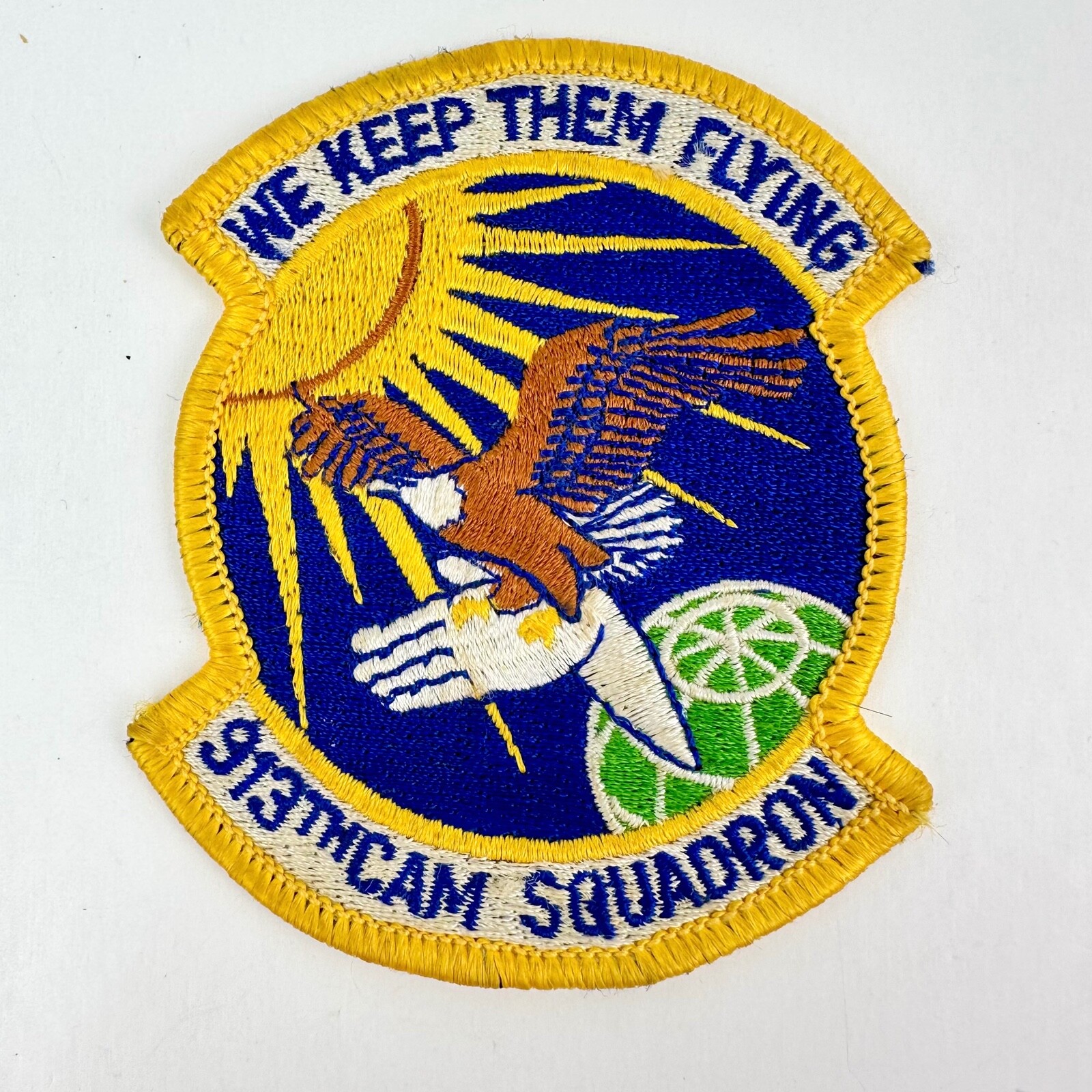 We Keep Them Flying 913th Cam Squadron Patch Eagle on Hand 2.5" x 3.25"