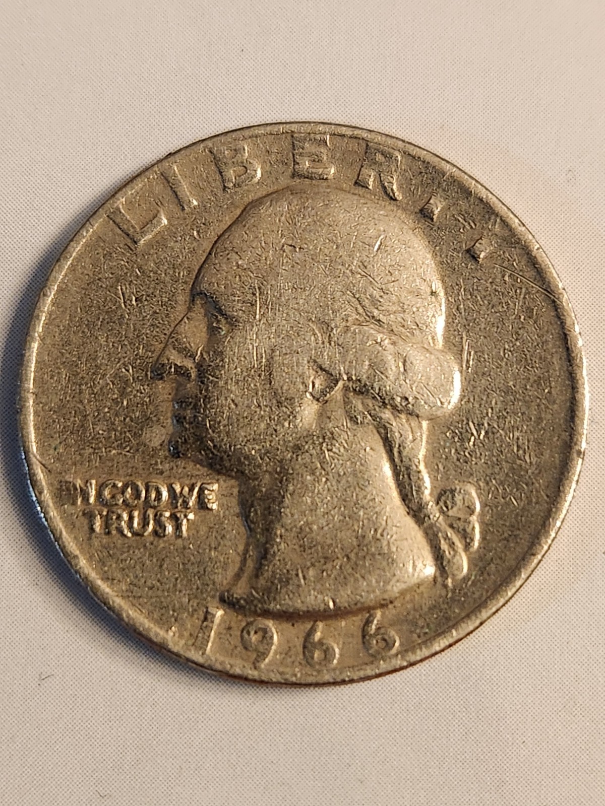 1966 quarter no mint mark . (In) And( A) errors