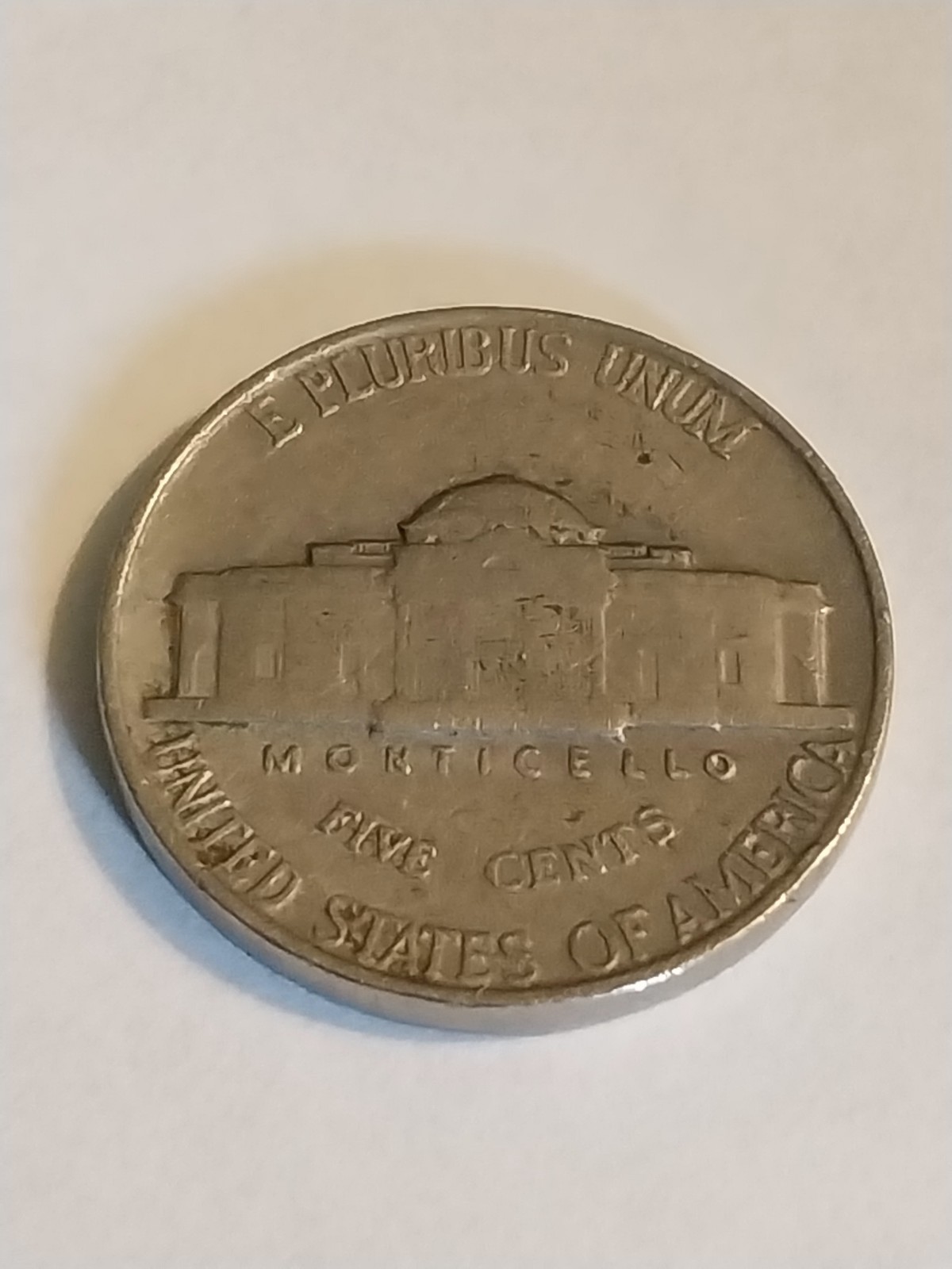 1939 Error Jefferson Nickel. Reverse Doubling. Circulated. Needs Cleaning.