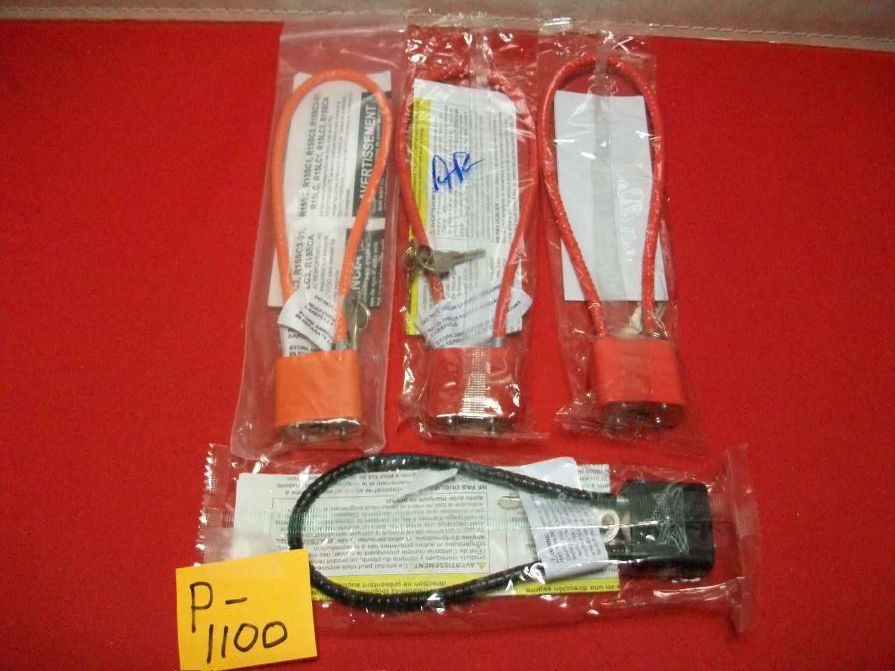 4 BRAND NEW PROTECTION DEVICE  CABLE LOCKS WITH KEYS IN SEALED FACTORY PKGS. NIP