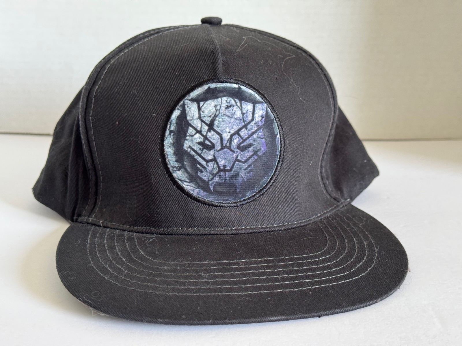 Berkshire Fashions Marvel Black Panther Cracked Stone Adjustable Snapback Hat