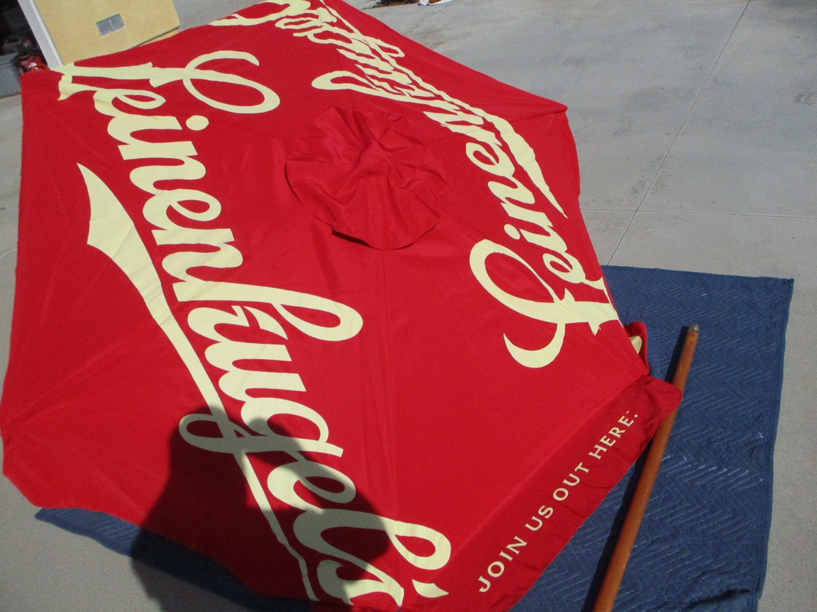LEINENKUKEL PROMO UMBRELLA 86 X 86 RED PRE-OWNED NEVER USED (MISSING WOOD TOP)