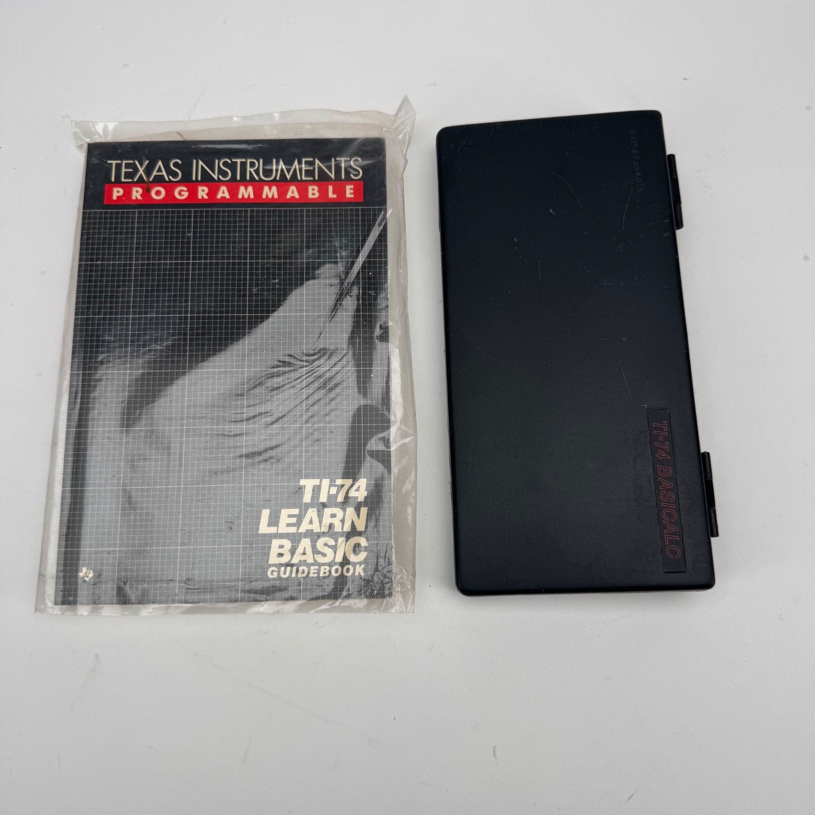 Texas Instruments TI-74 BASICALC Programmable Calculator + Learn BASIC Guidebook
