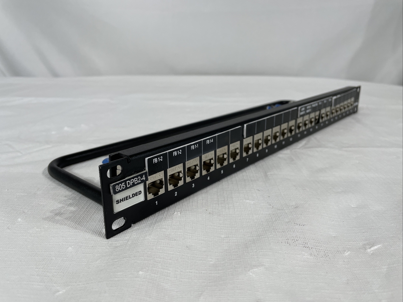 Leviton Cat 5e Flat Universal Patch Panel 24-Port, Cable Management Bar