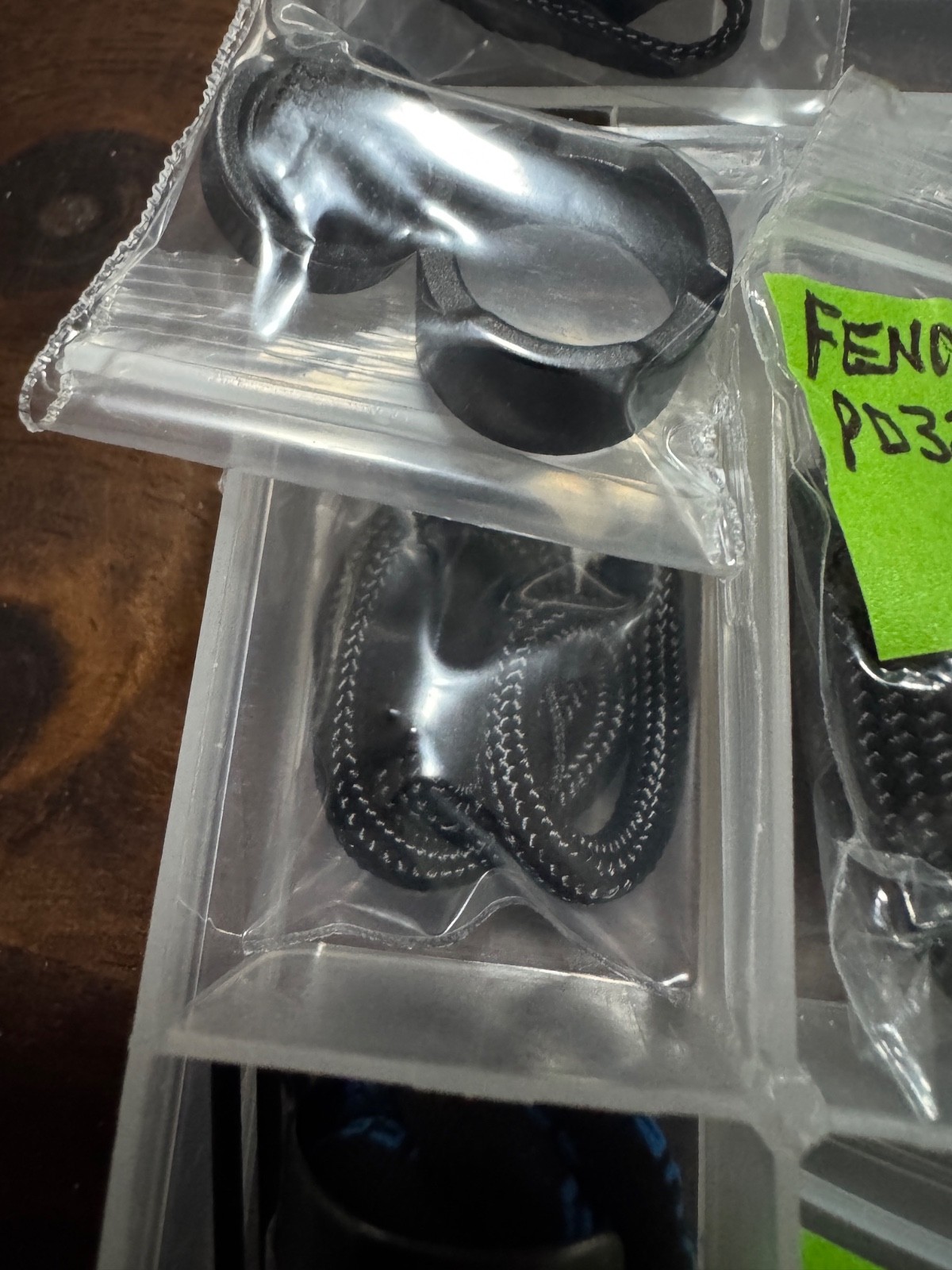 Flashlight Lanyards, O rings and an Olight Flashlight Charger