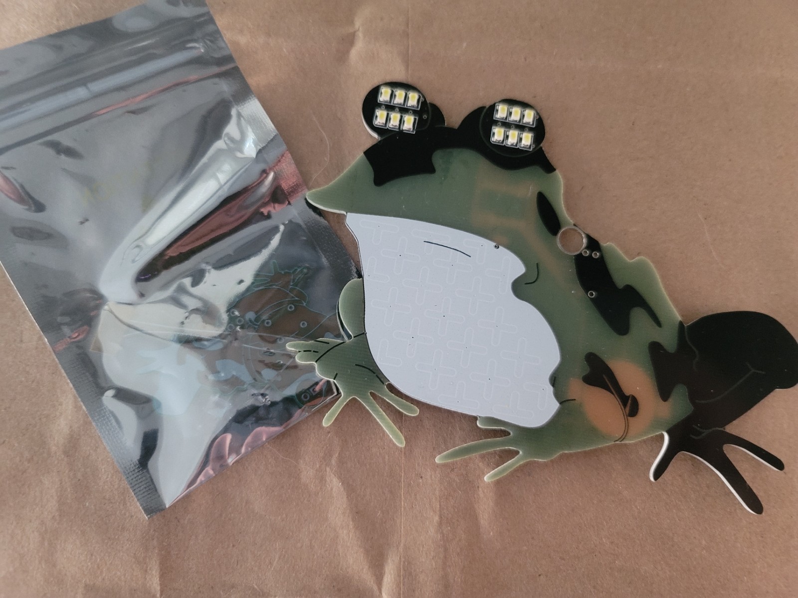 Defcon Hacking Conference Hypnotoad Badge With AND!XOR Hypnotoad Sao