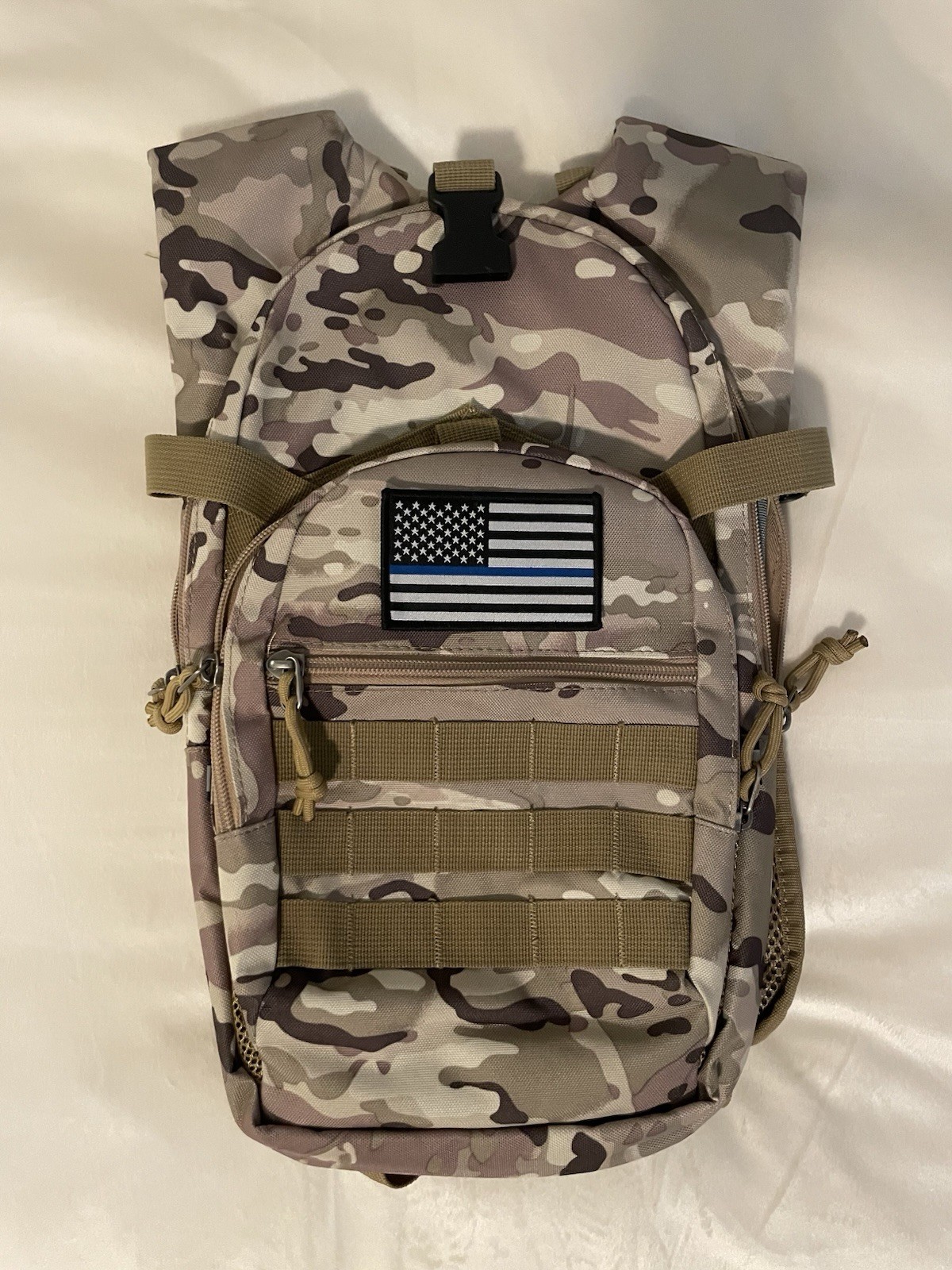 Tactical MOLLE Hydration Backpack with a camouflage pattern.No bladder.(sku#M1)